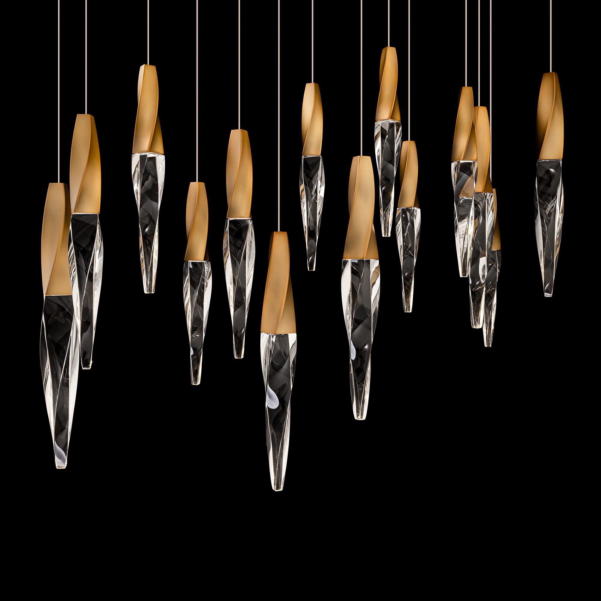 Shown in Aged Brass finish and Optic Crystal crystal