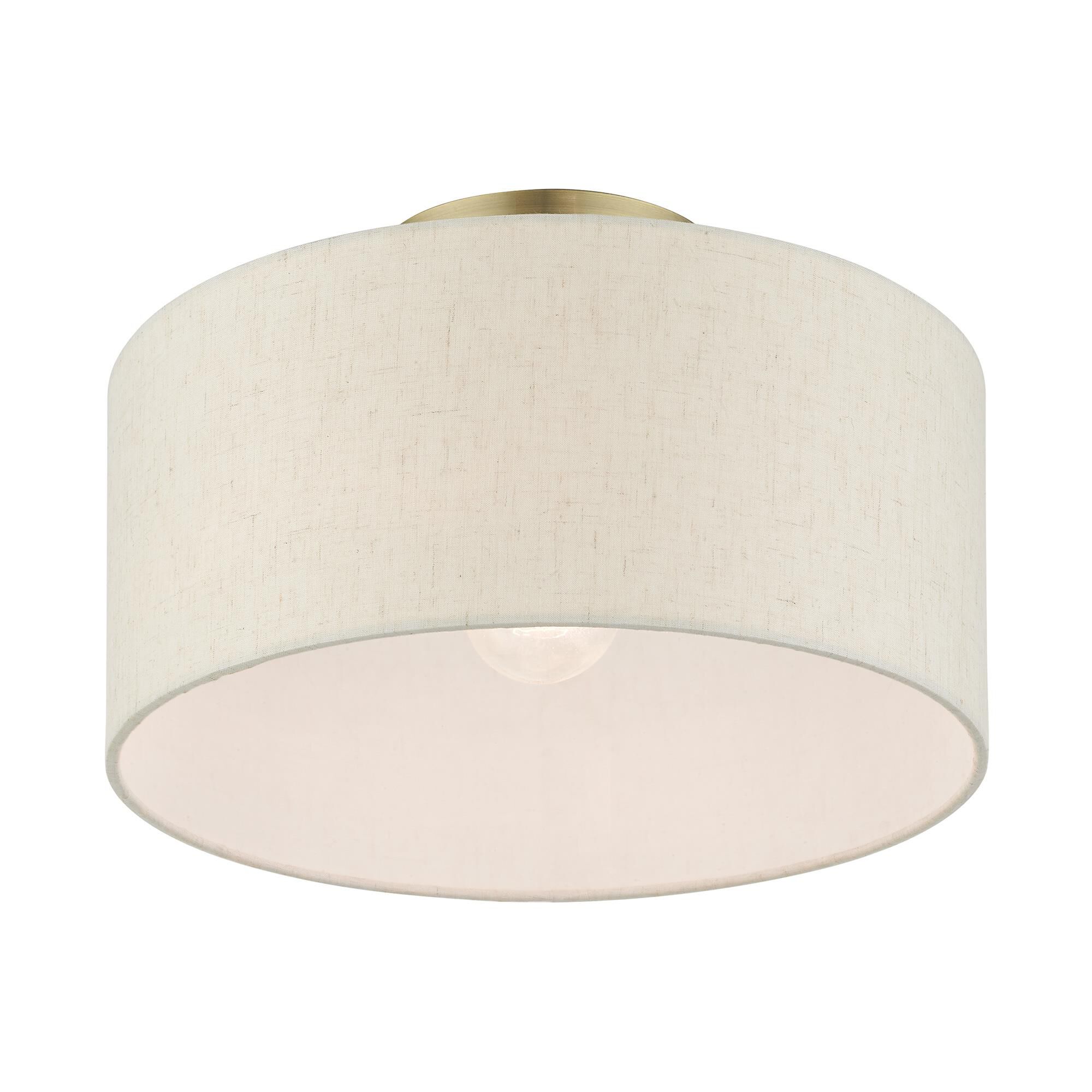 Shown in Antique Brass finish and Hand Crafted Hardback  Completely Finished With Oatmeal Color Fabric Outside and Inside shade