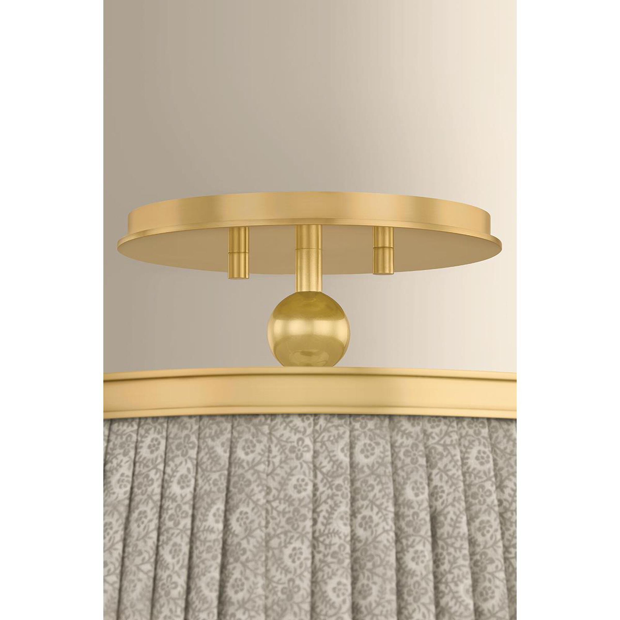Shown in Aged Brass finish and Gathered Printed Cotton shade