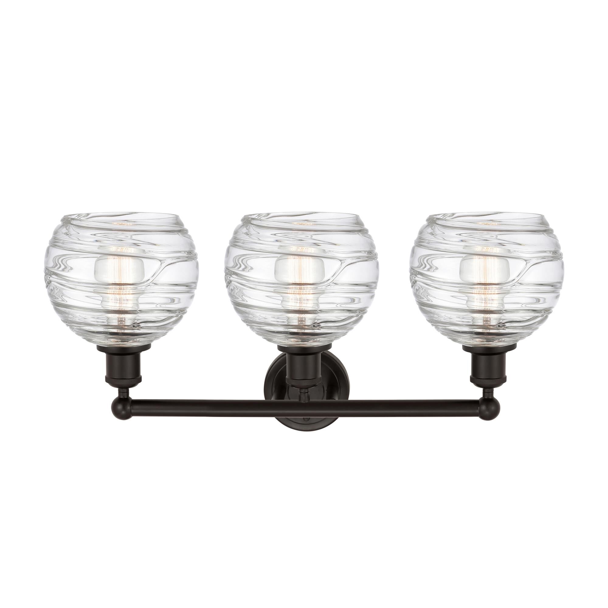 Shown in Oil Rubbed Bronze finish and Clear Deco Swirl glass