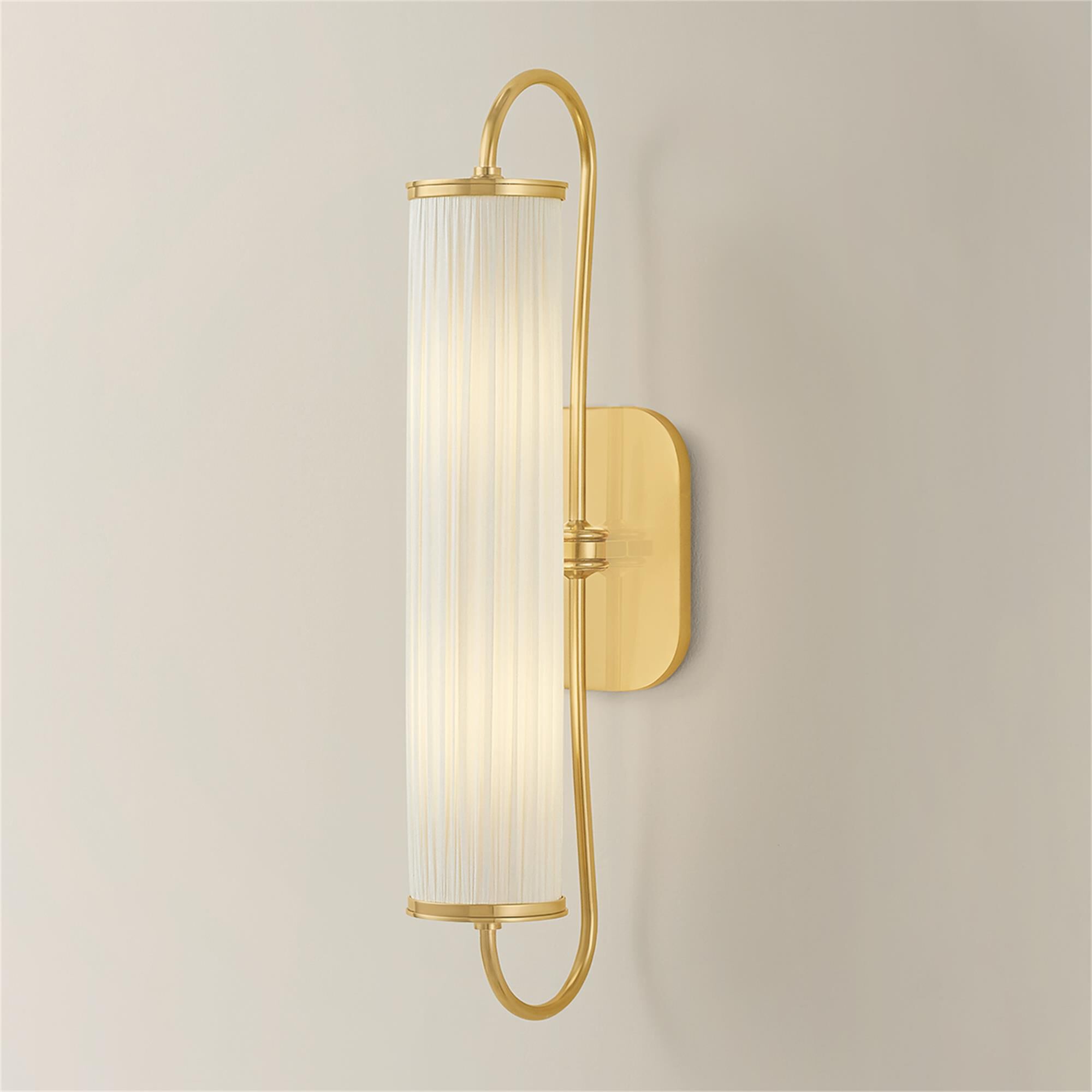 Shown in Aged Brass finish and Ivory Silk shade