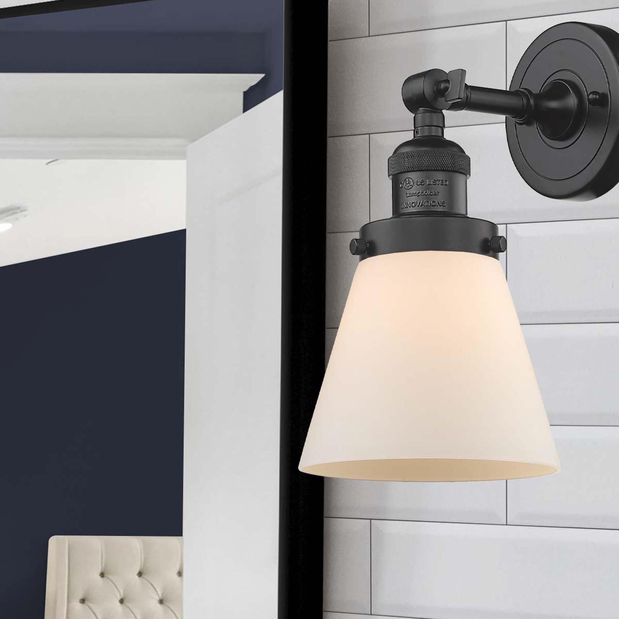 Shown in Oil Rubbed Bronze finish and Matte White Cased glass