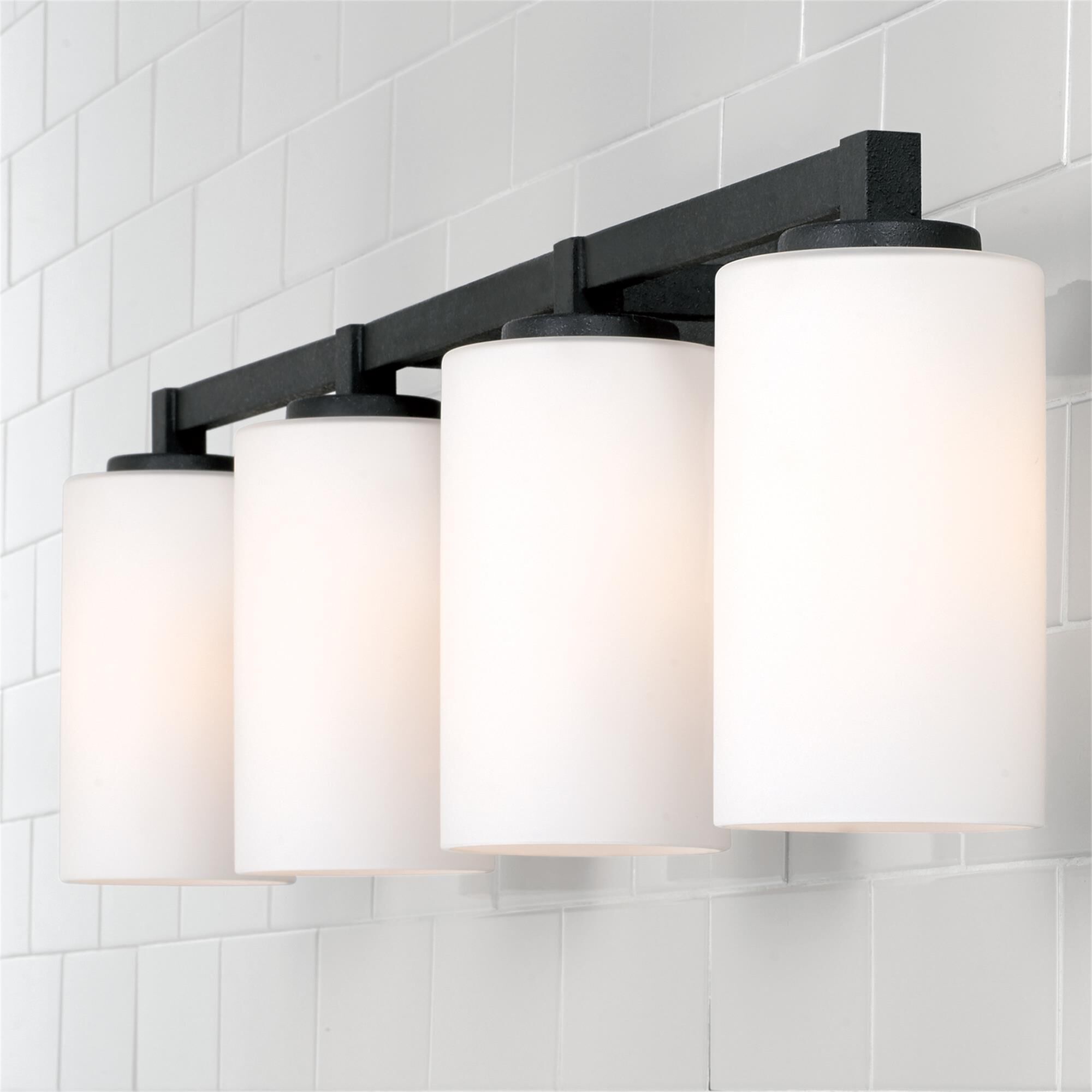 Shown in Black Iron finish and Soft White glass