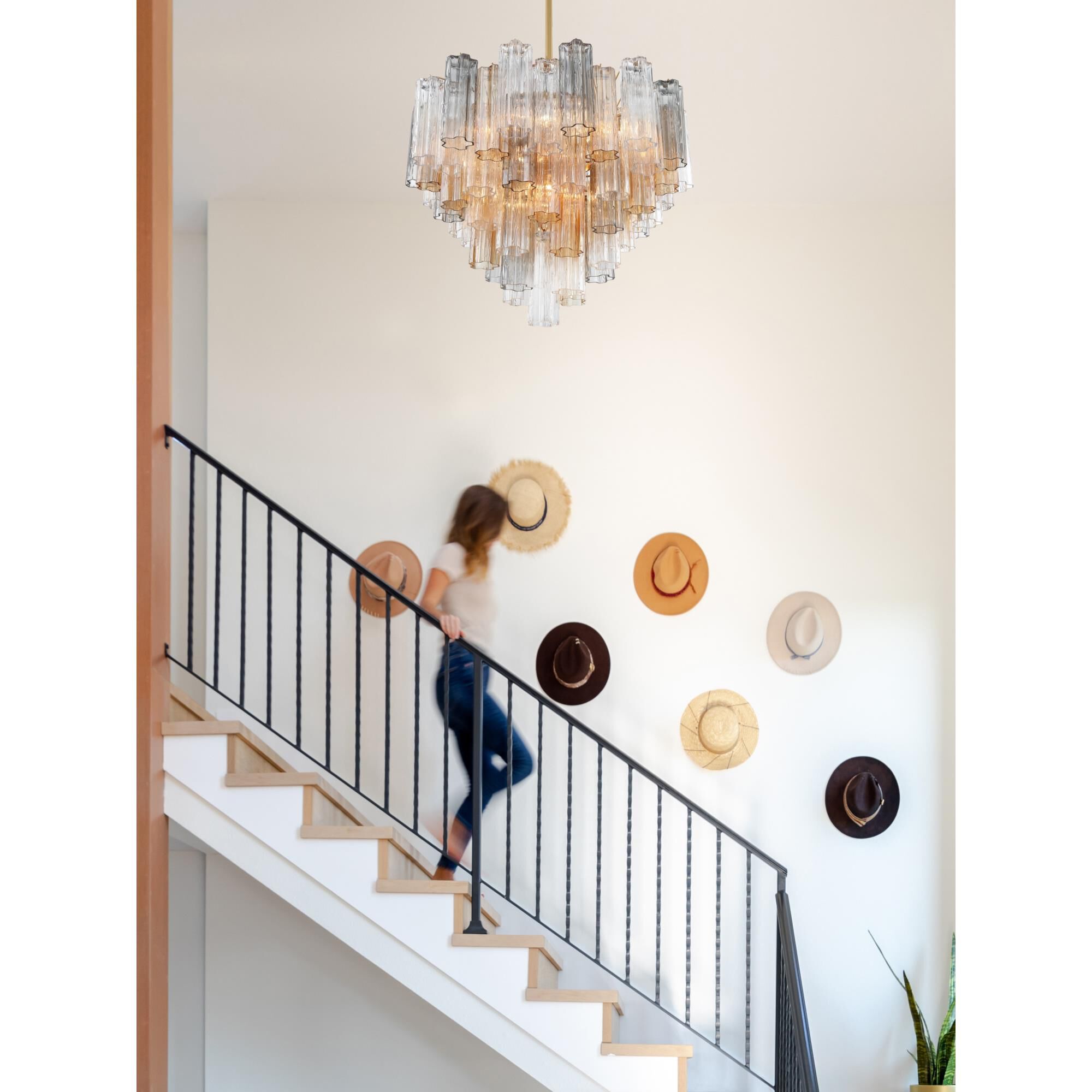 Shown in Aged Brass finish and Tronchi Autumn glass