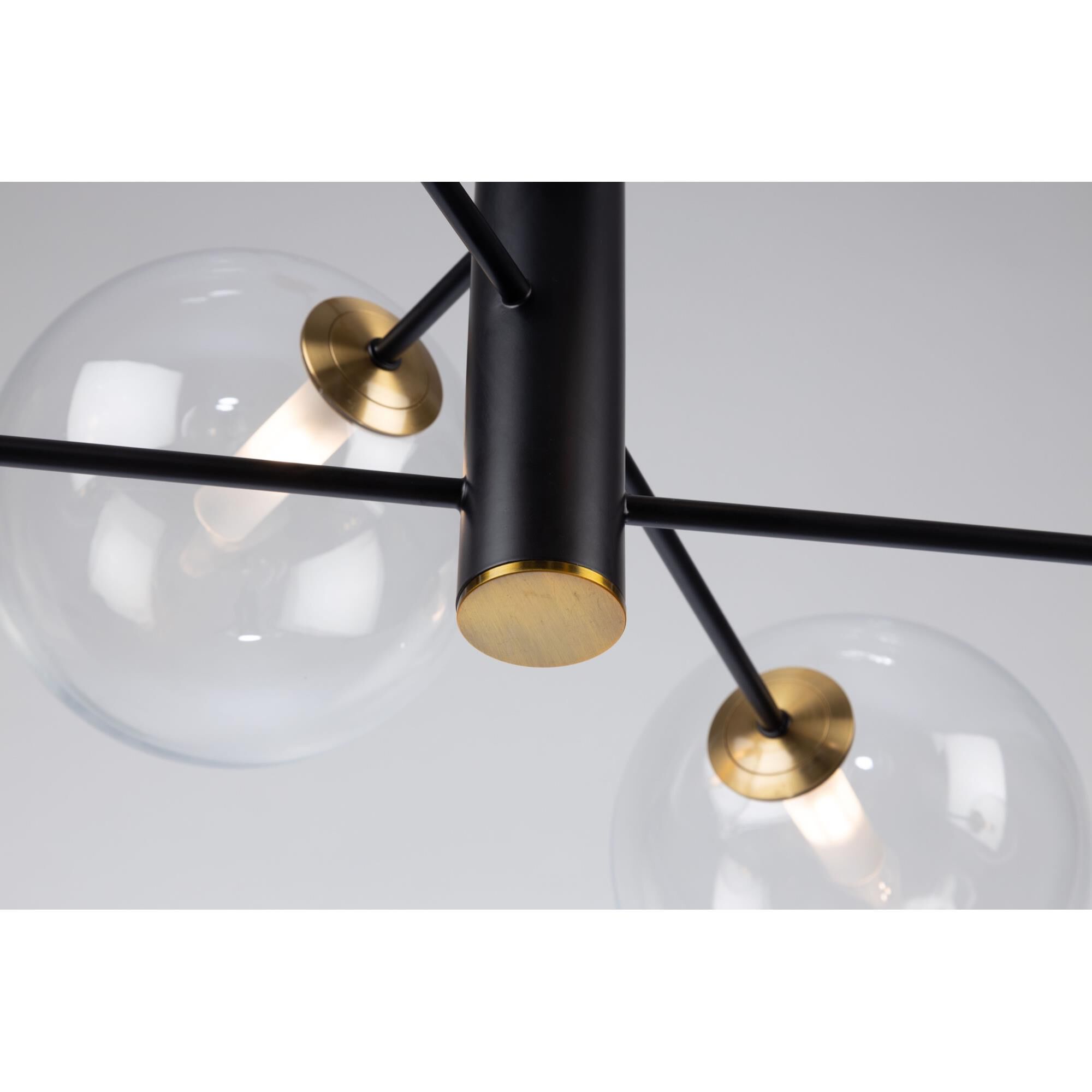 Shown in Matte Black & Brass finish and Glass shade