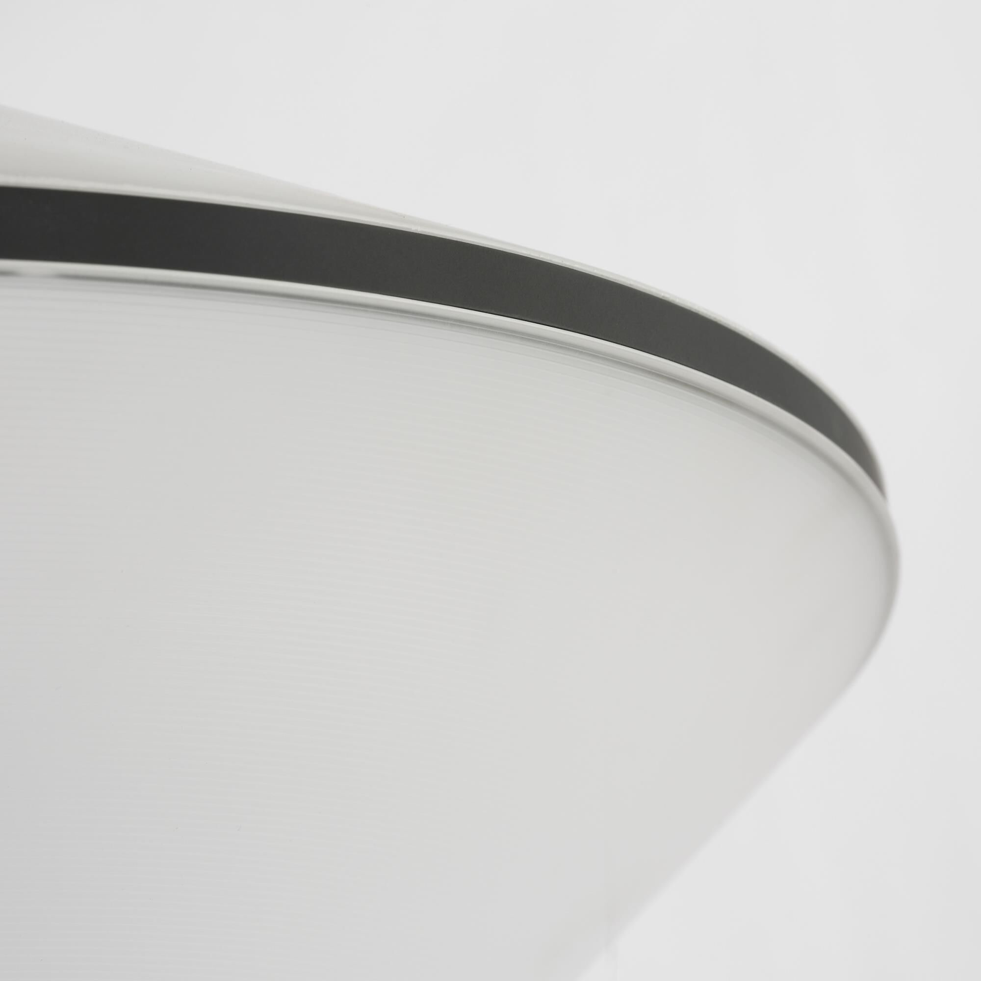 Shown in Nightshade Black finish and Opaque Carved Acrylic glass