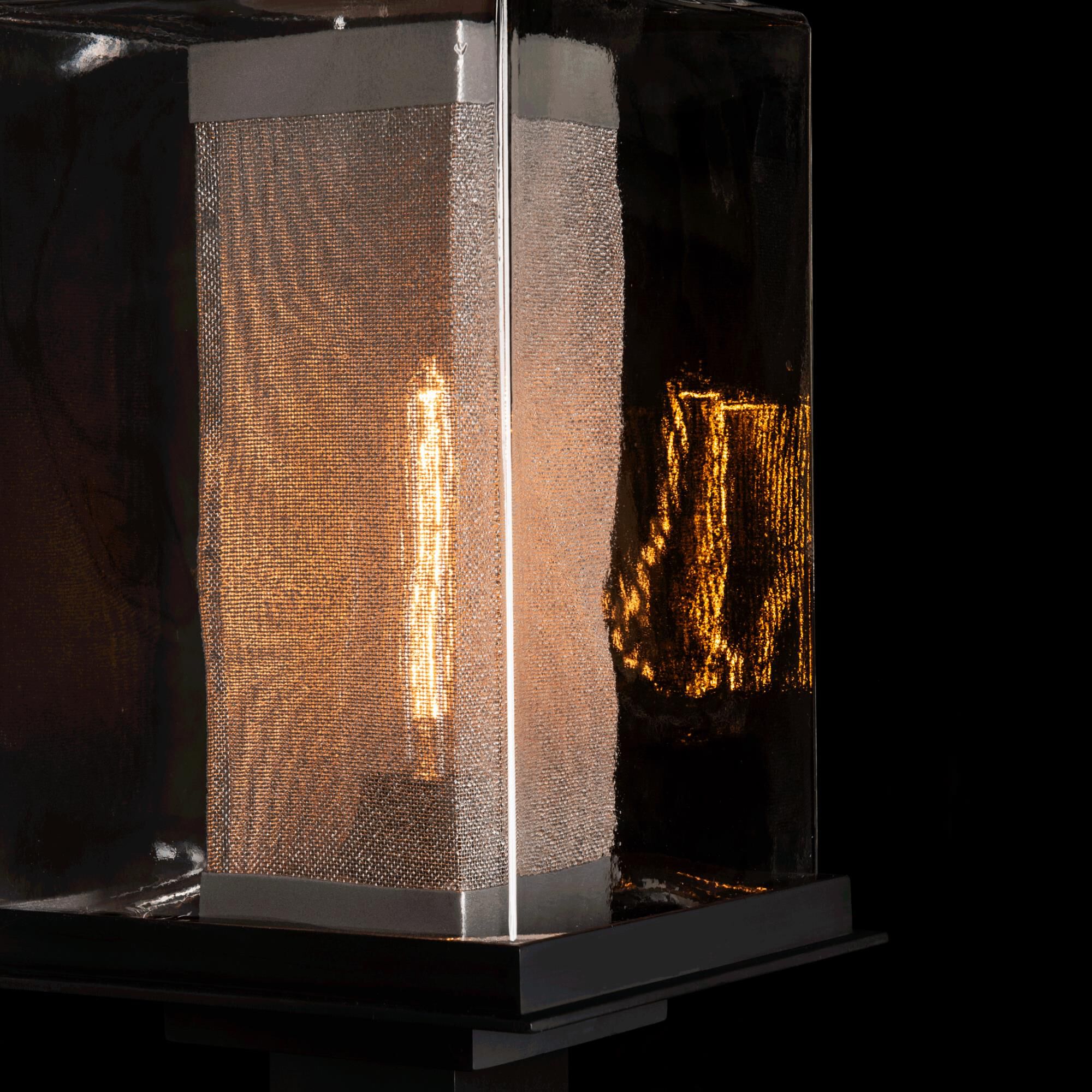 Shown in Coastal Black finish and Clear glass and Translucent Soft Gold accent