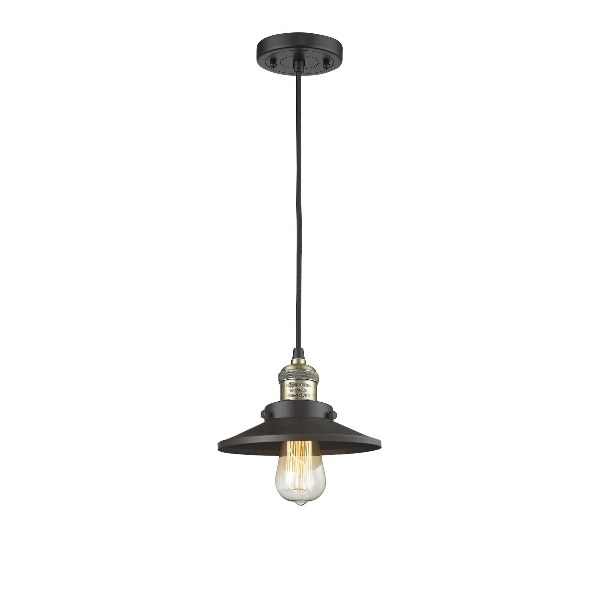 Shown in Black Antique Brass finish and Matte Black shade
