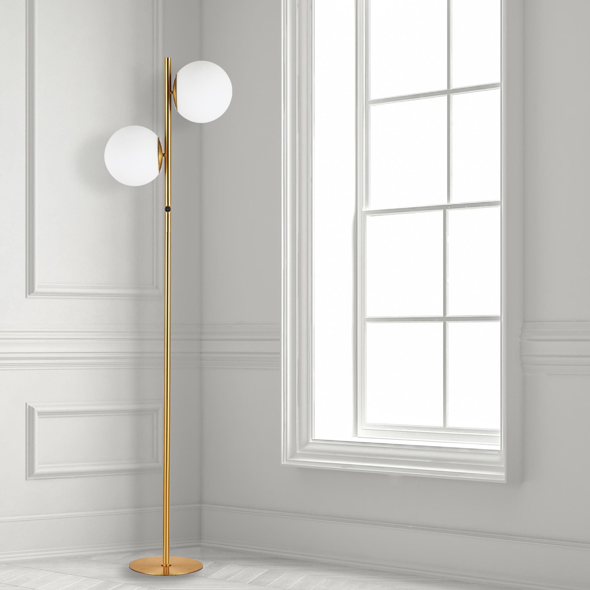 Shown in Aged Brass and White finish and Opal White Globe glass
