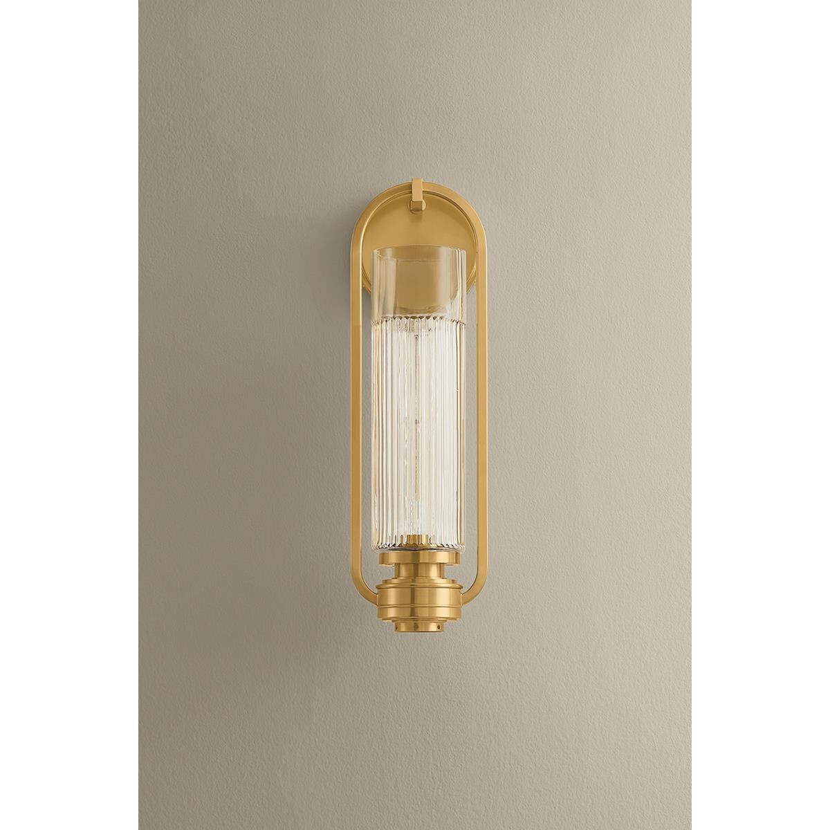 Shown in Aged Brass finish and Clear Optic glass