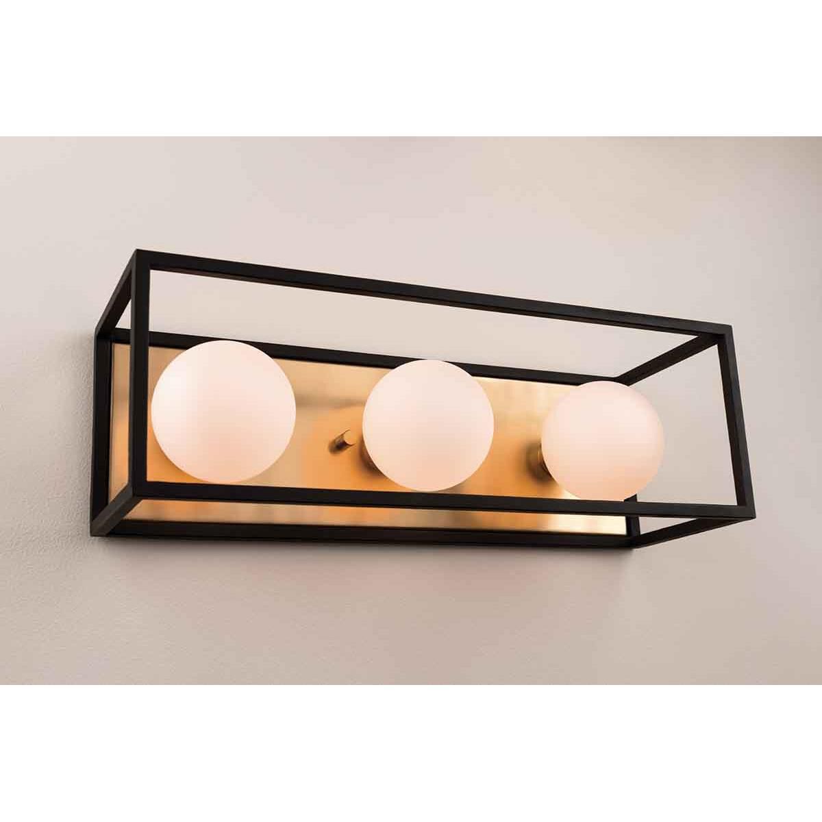 Shown in Aged Brass finish and Opal Etched glass and Black accent