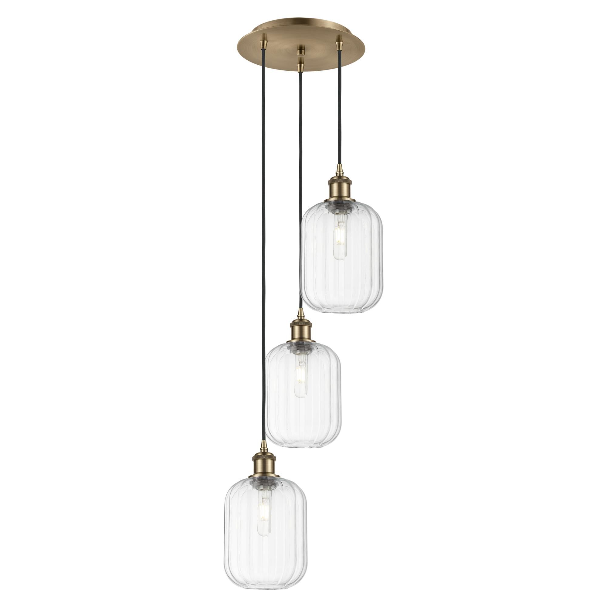Shown in Antique Brass finish and Clear glass