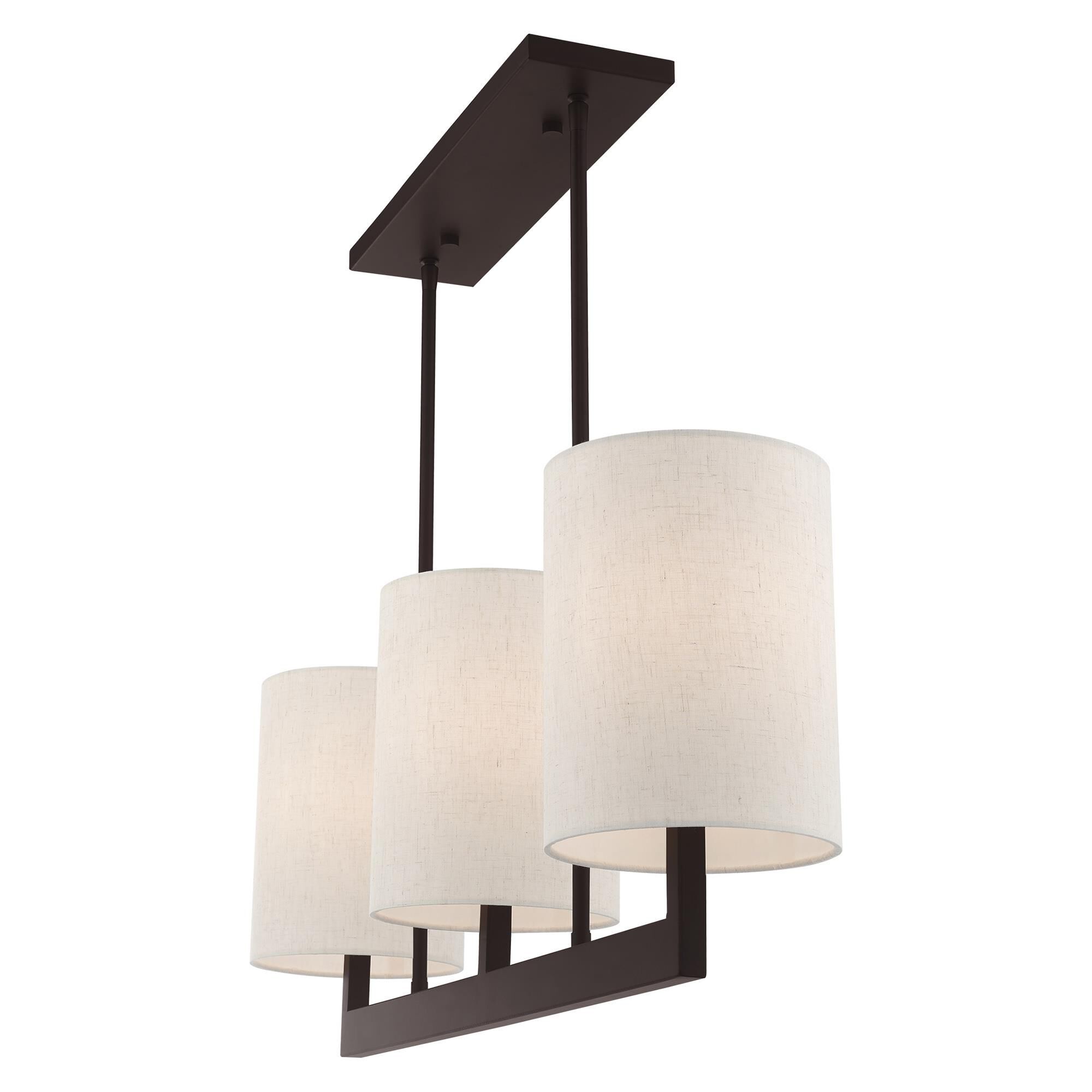 Shown in Bronze finish and Hand Crafted Oatmeal Color Fabric Outside & White Fabric Inside Hardback shade