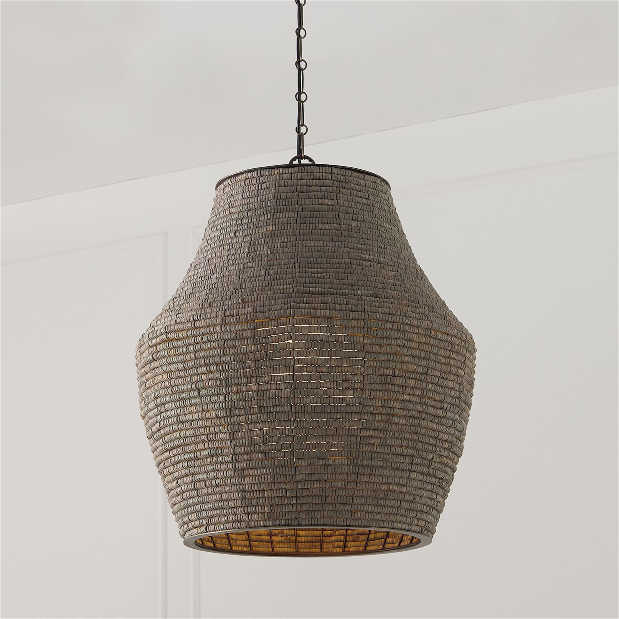 Shown in Aegean Grey And Dark Brass finish and White  Globe glass
