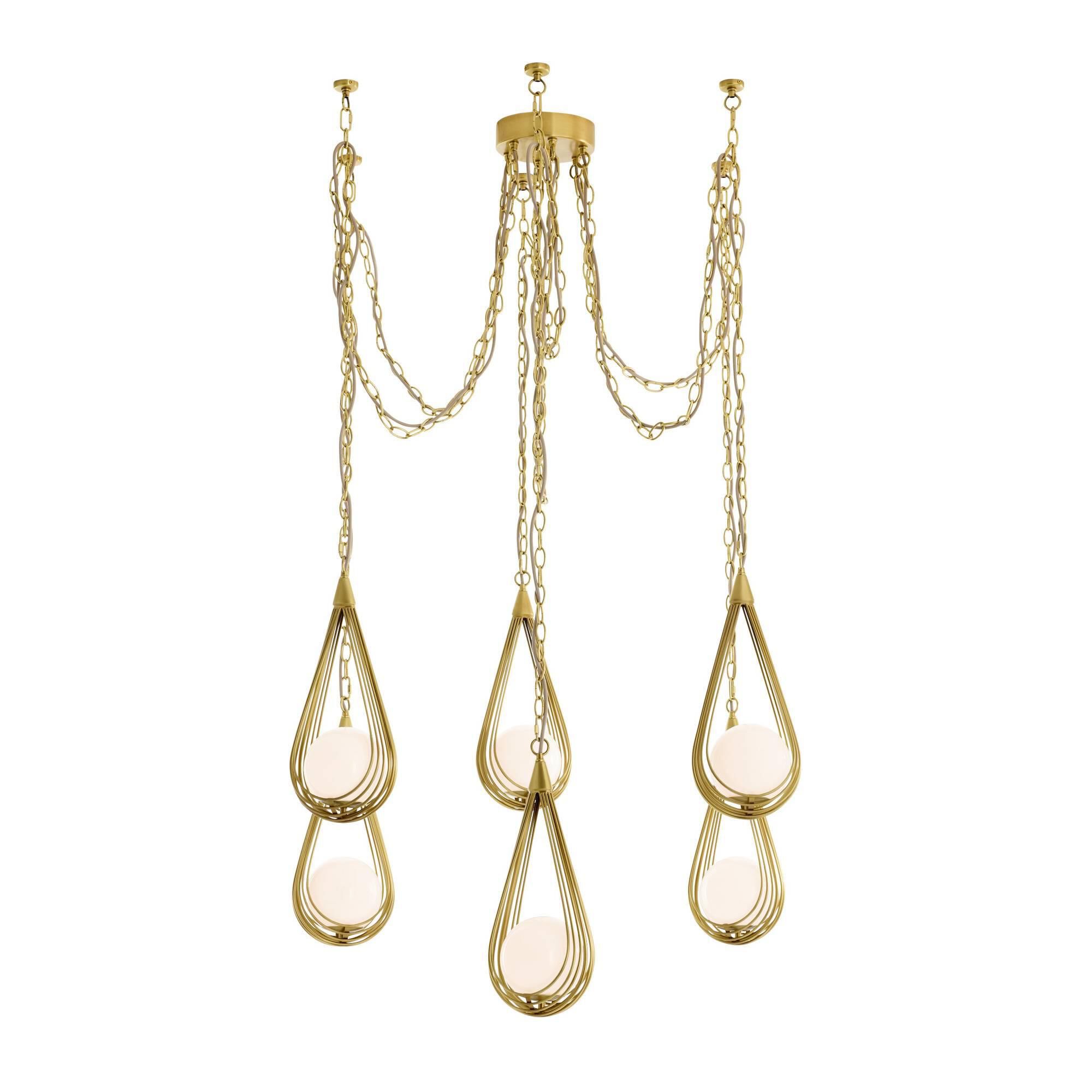Shown in Antique Brass finish and Opal glass