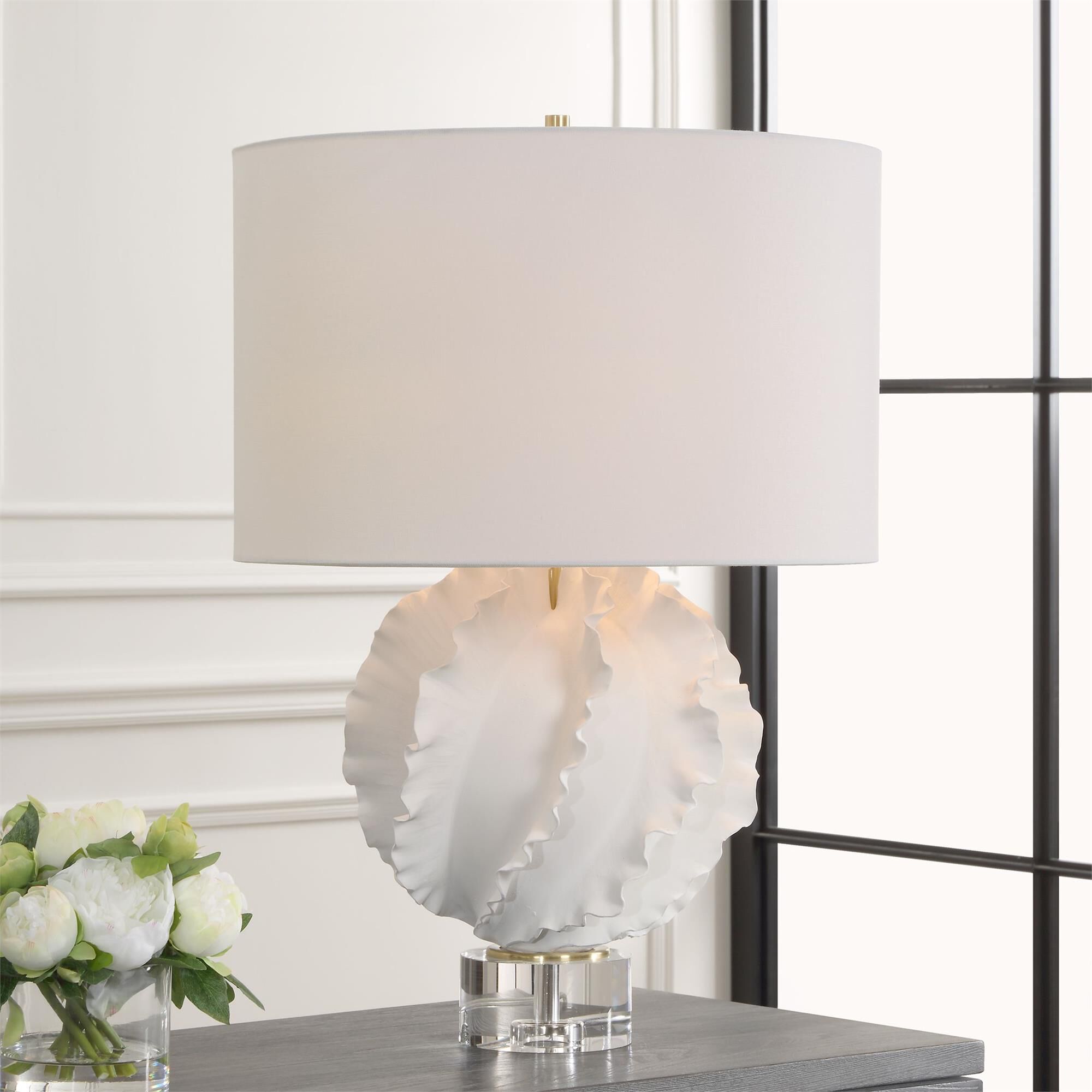 Shown in This Ceramic Table Lamp Is Finished In A Satin White Glaze Featuring Gracefully Flowing Deep Ridges, finish and Round Hardback shade