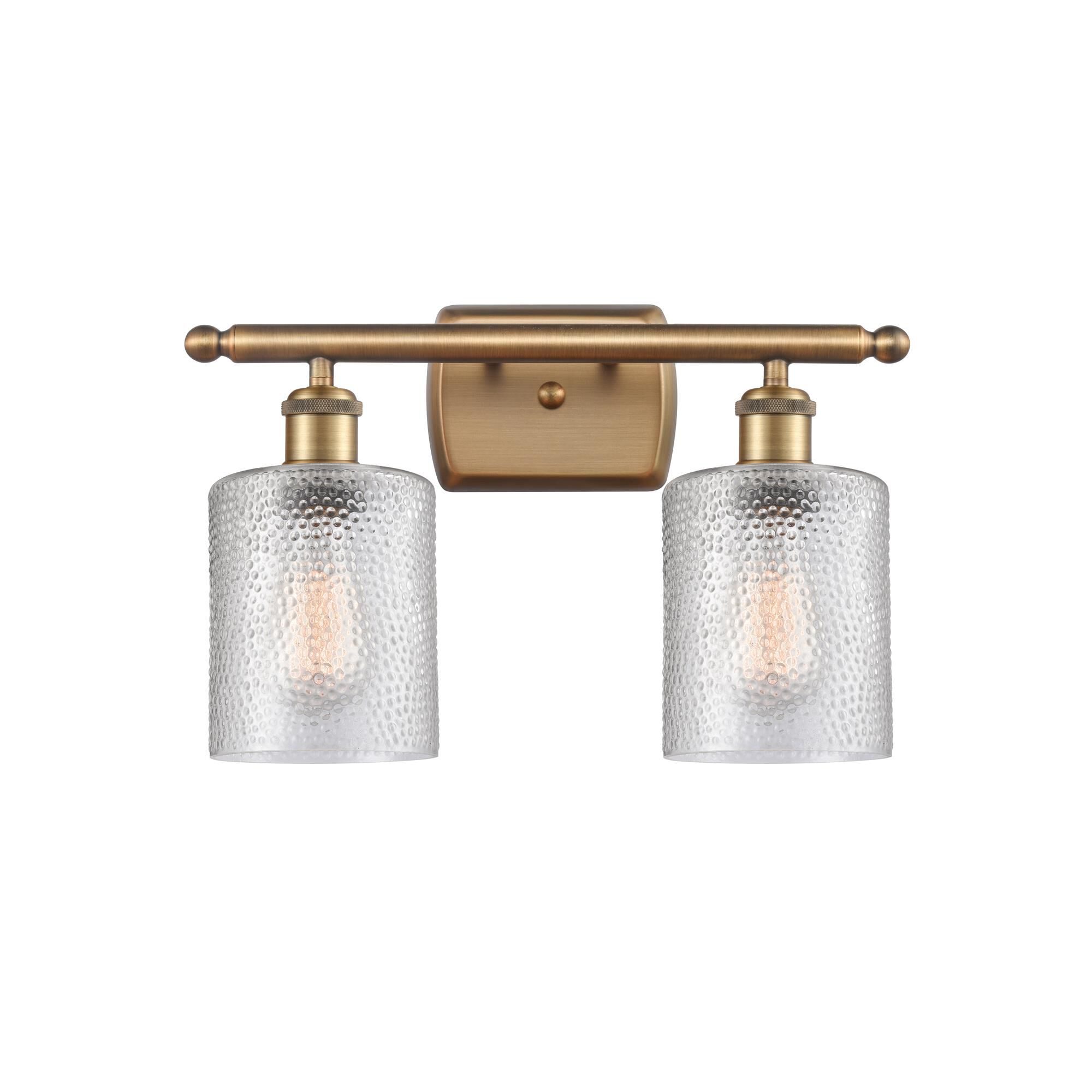 Shown in Brushed Brass finish and Drum glass and Glass shade and Polished Chrome accent