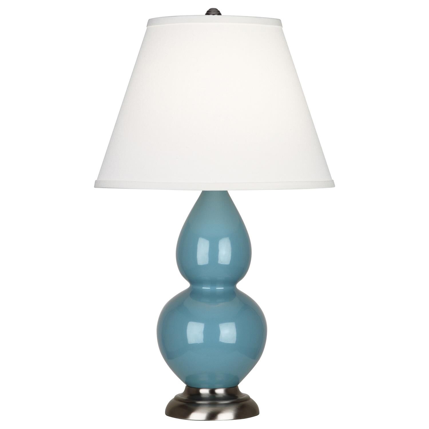 Shown in Steel Blue Glazed Ceramic With Antique Silver ed Accents finish and Pearl Dupioni Fabric shade