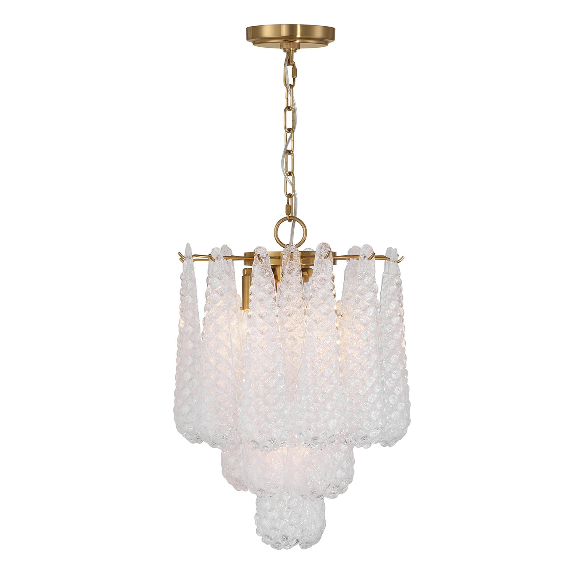 Shown in Aged Brass finish and Sand Clear glass