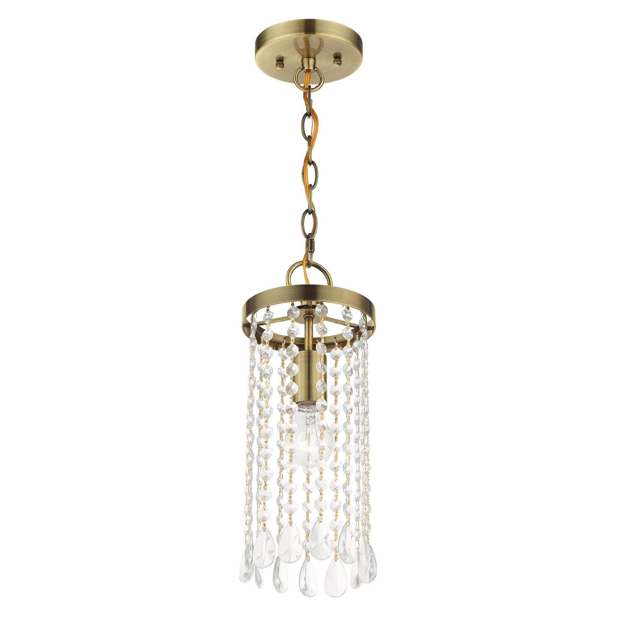 Shown in Antique Brass finish and Hand Assembled Crystal Shade glass