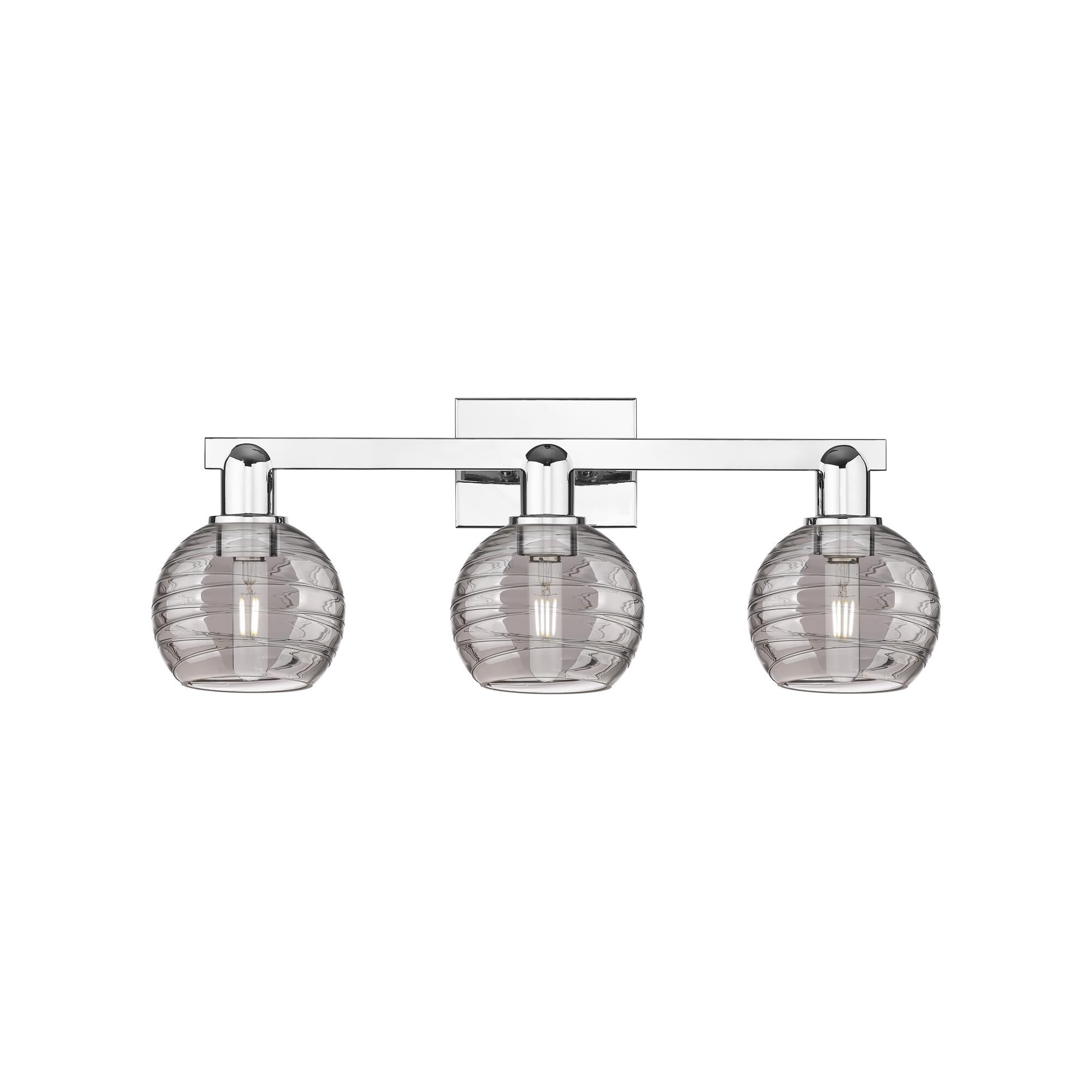 Shown in Polished Chrome finish and Light Smoke Deco Swirl glass