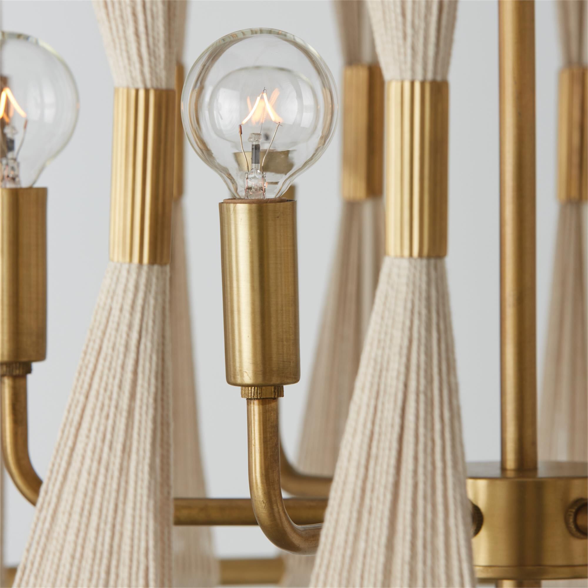 Shown in Bleached Natural Rope And Patinaed Brass finish