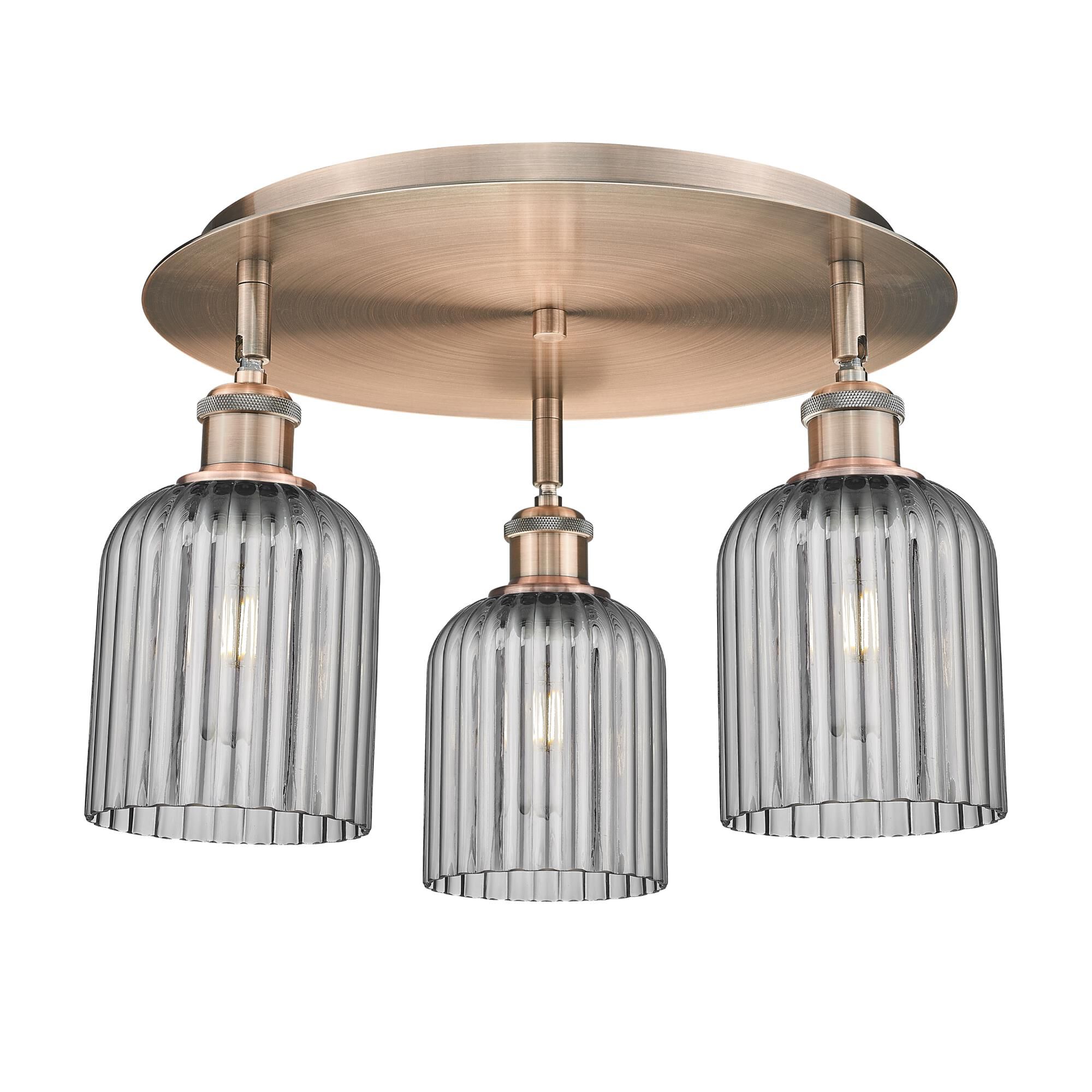 Shown in Antique Copper finish and Light Smoke shade