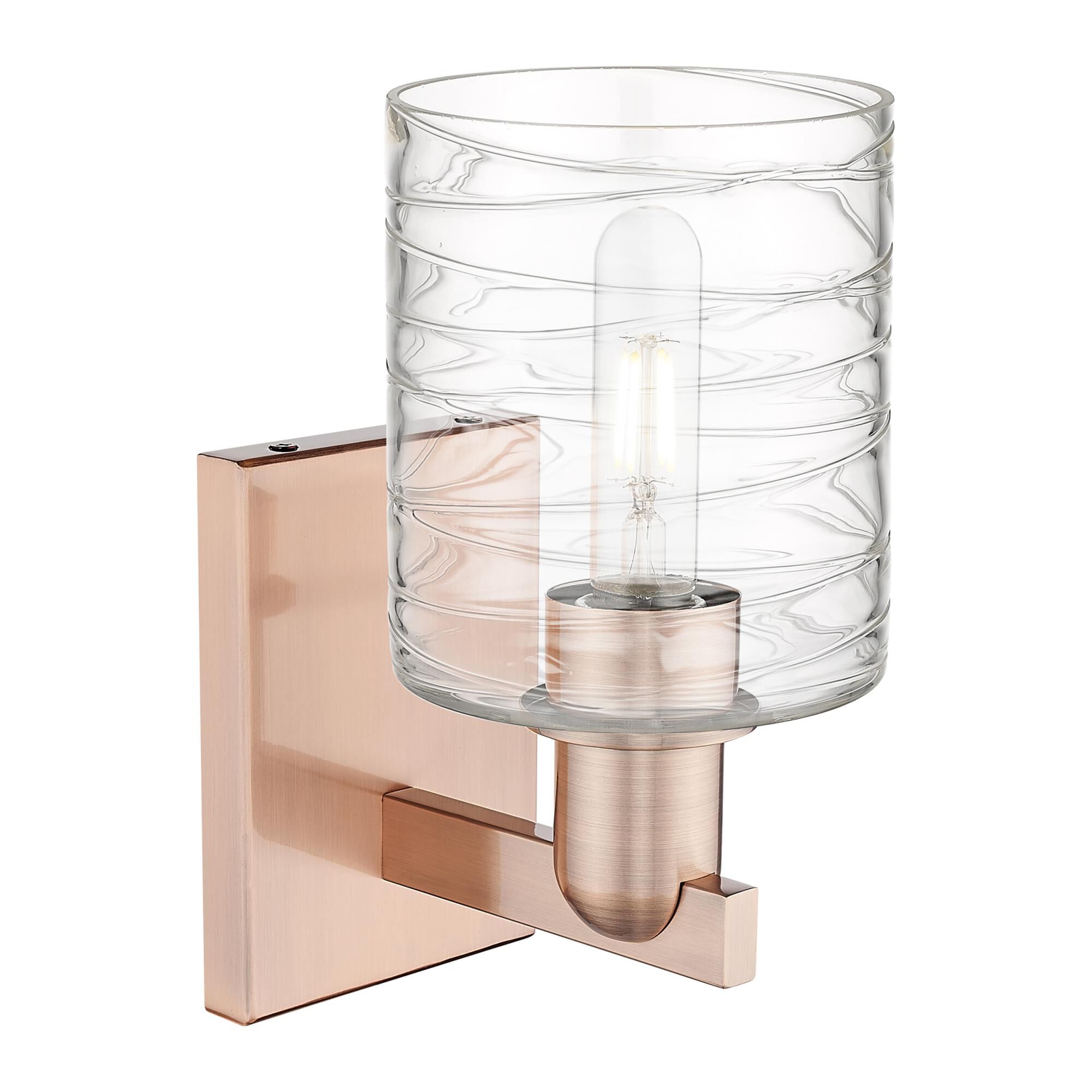 Shown in Antique Copper finish and Deco Swirl glass