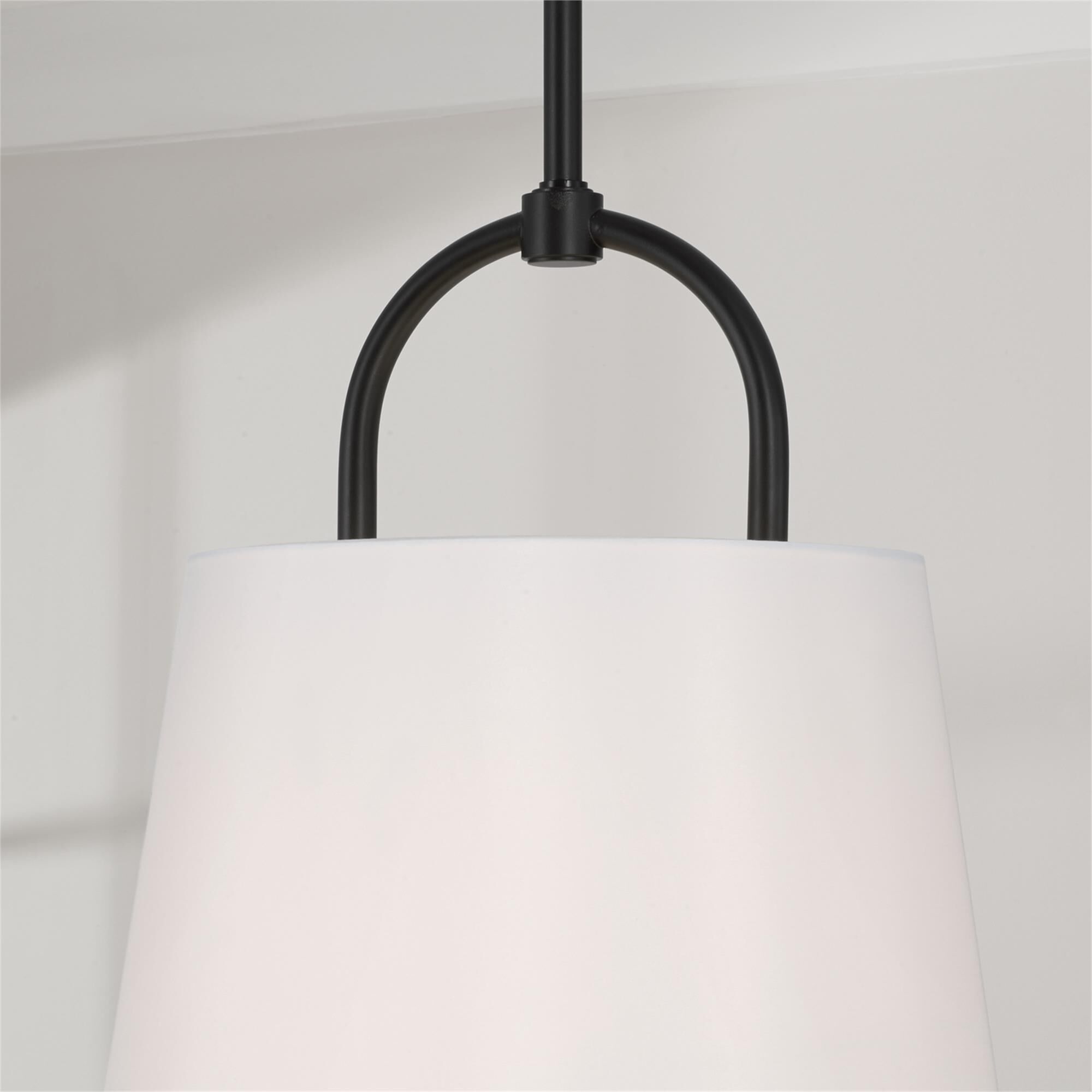 Shown in Matte Black finish and White Fabric shade