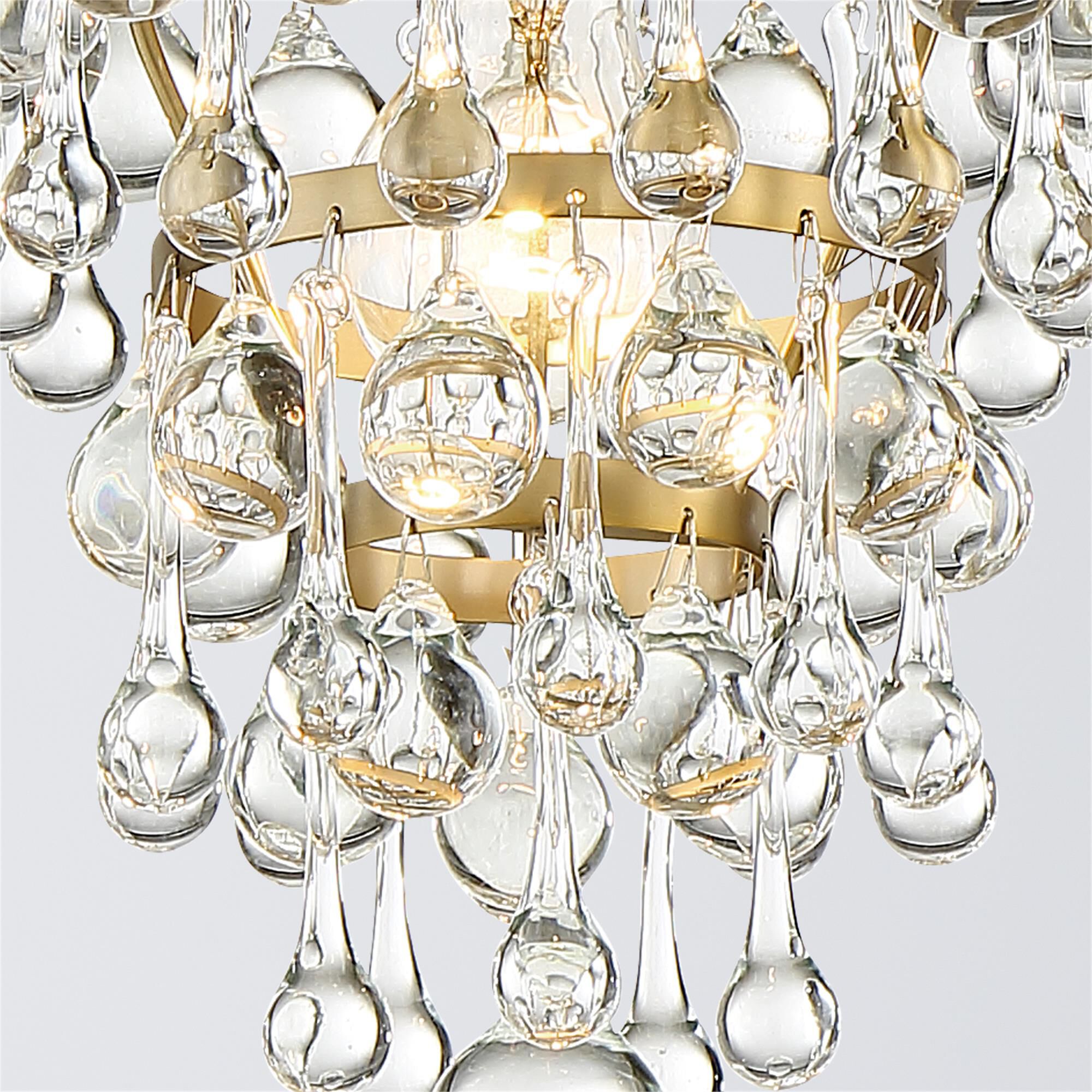 Shown in Vibrant Gold finish and Clear Glass Drops crystal