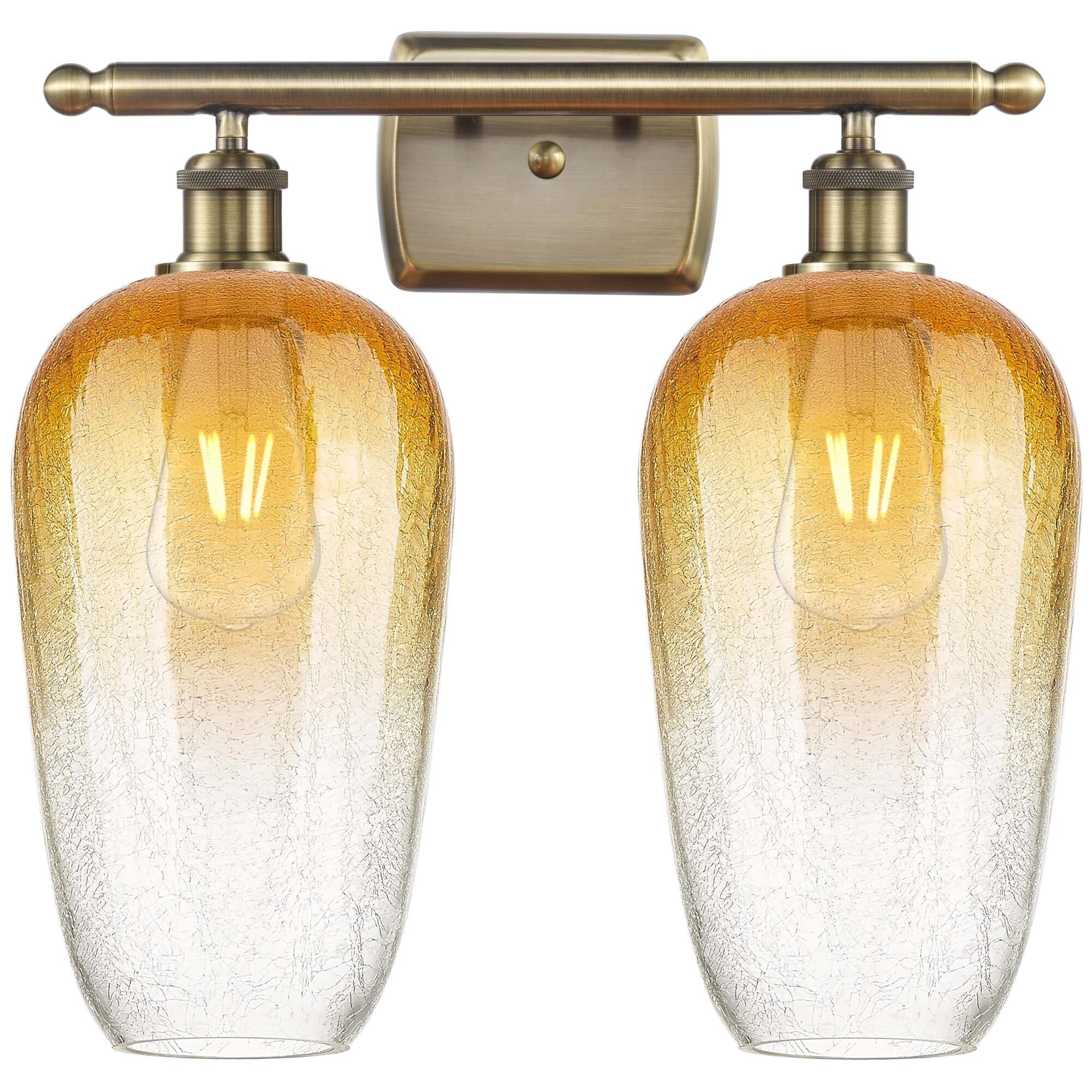 Shown in Antique Brass finish and Amber glass