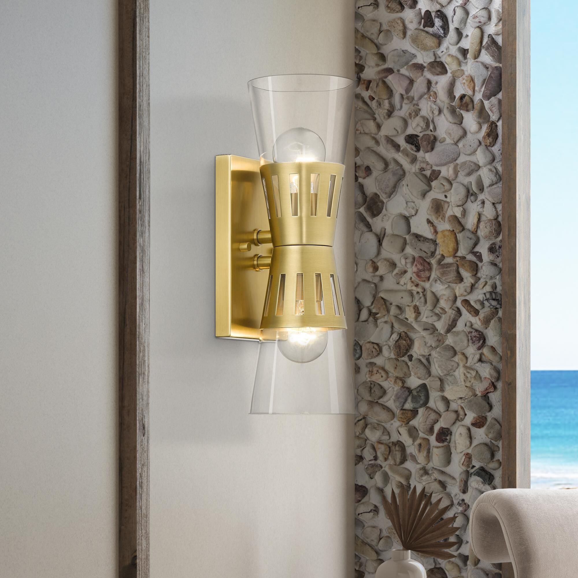 Shown in Natural Brass finish and Hand Blown Clear glass