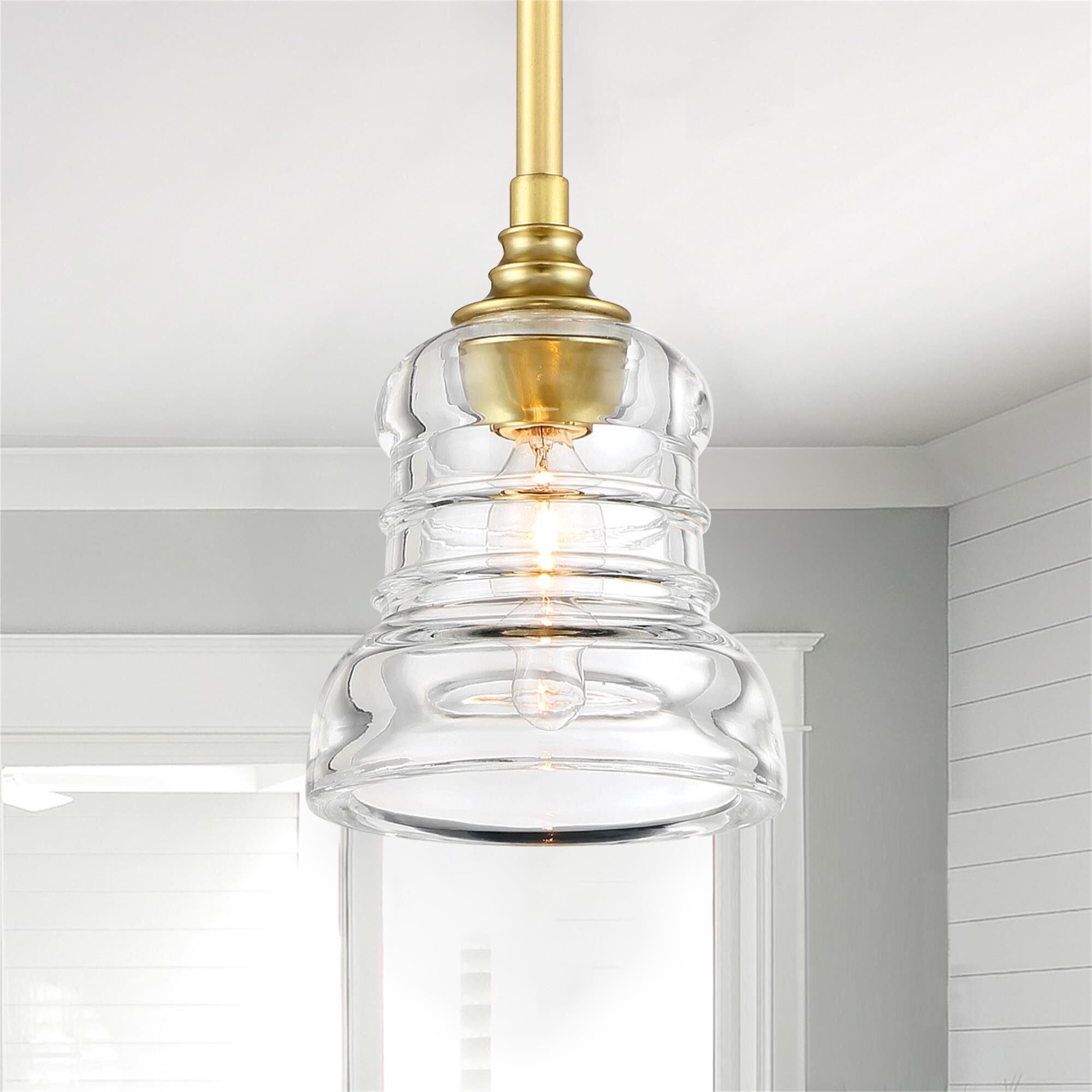 Shown in Aged Brass finish and Clear glass