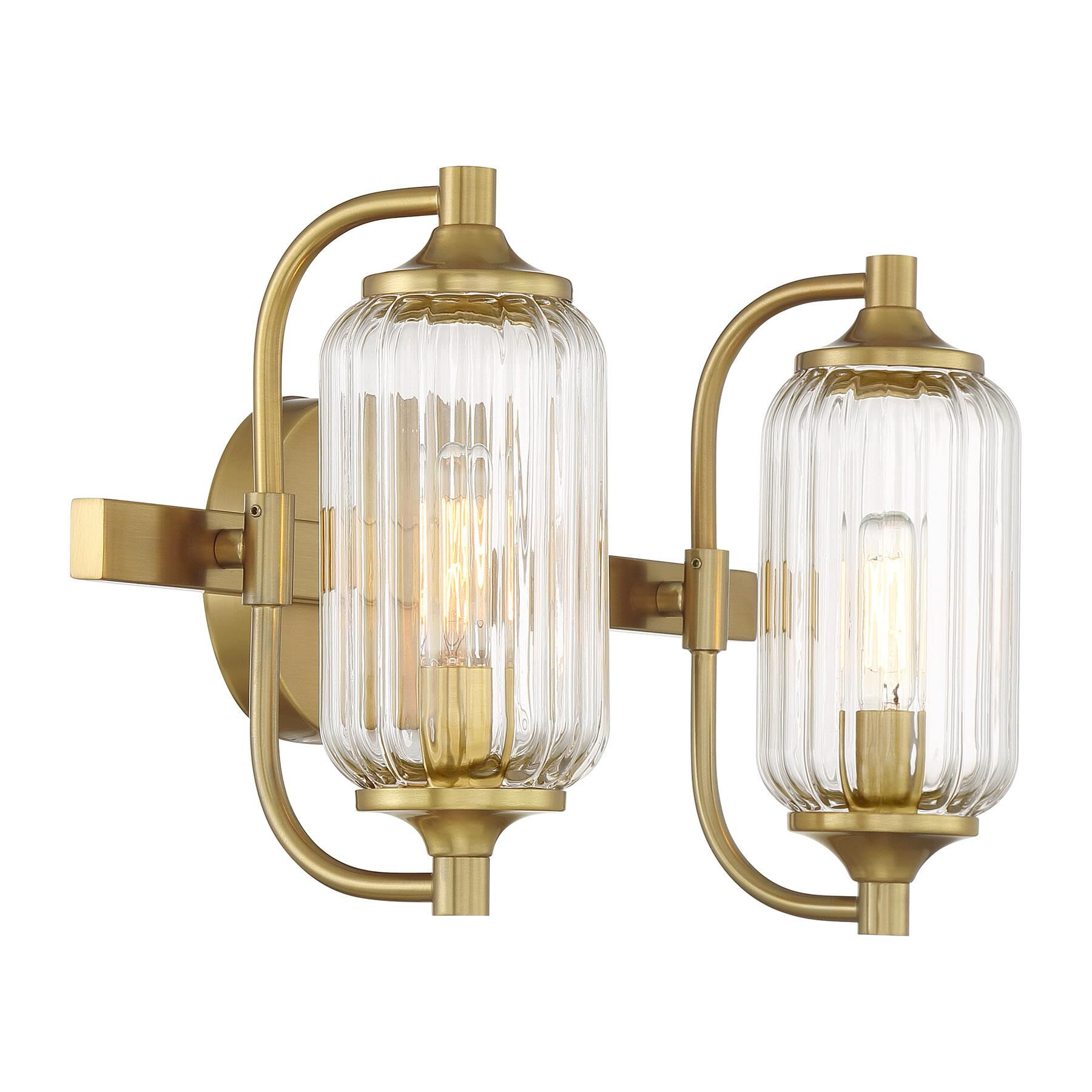 Shown in Warm Brass finish and Clear Ribbed glass