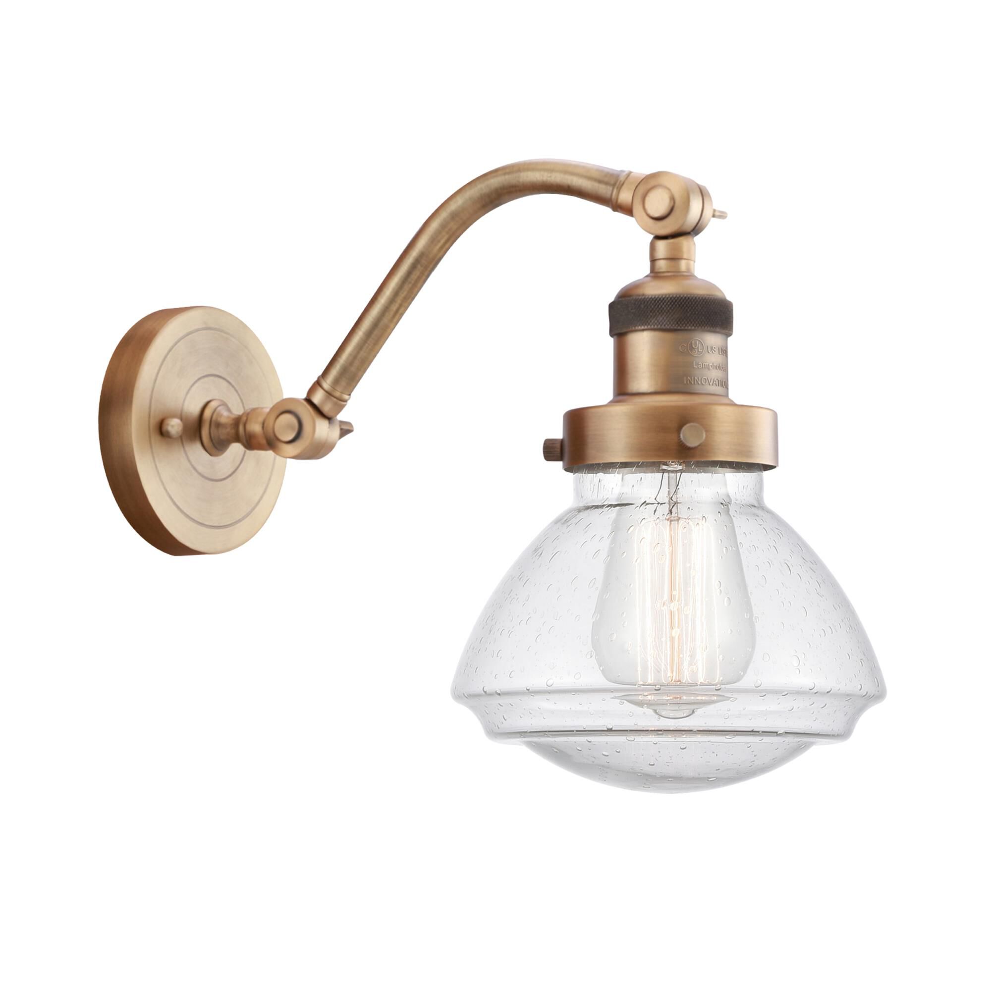 Shown in Brushed Brass finish and Seedy Olean glass