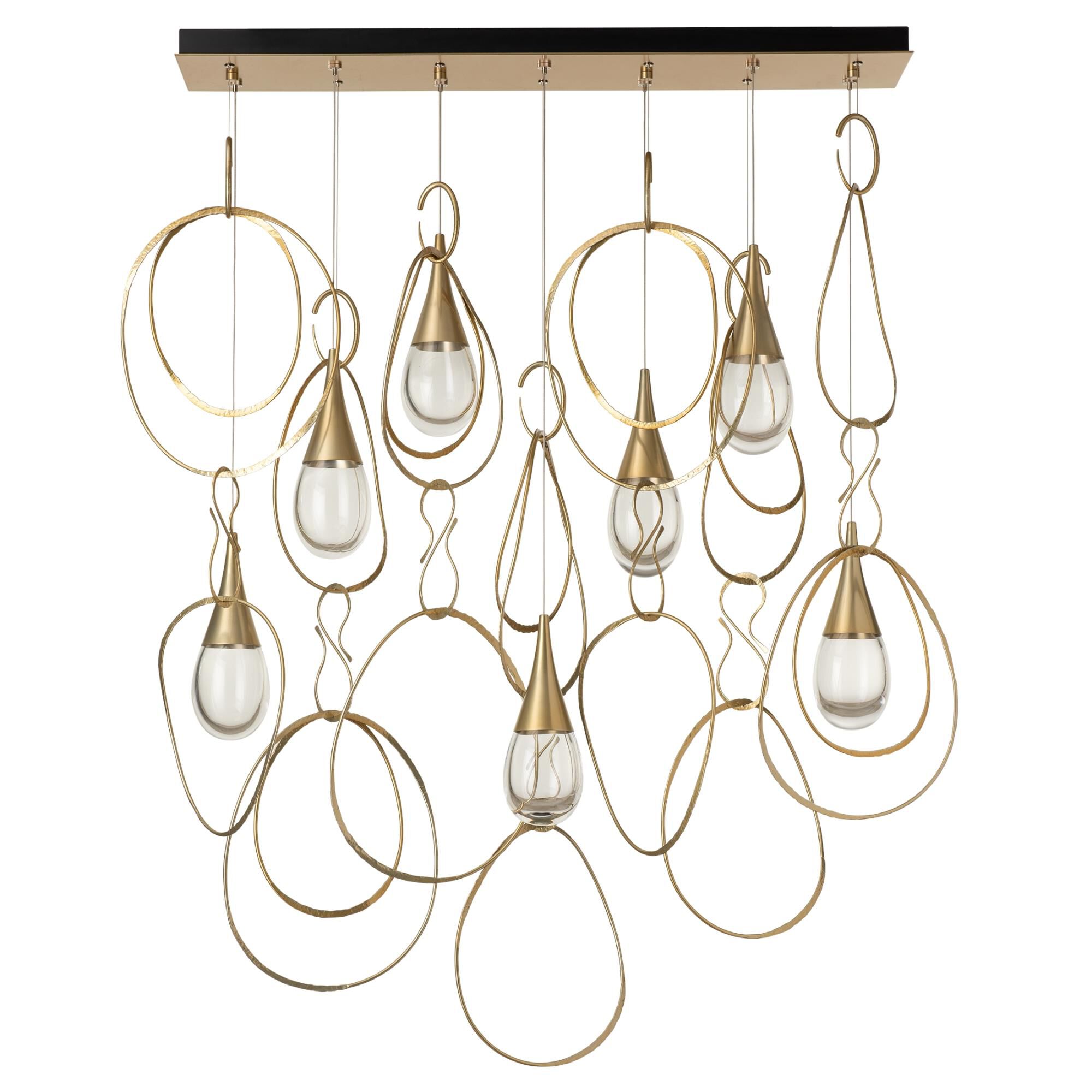 Shown in Modern Brass finish and Clear glass