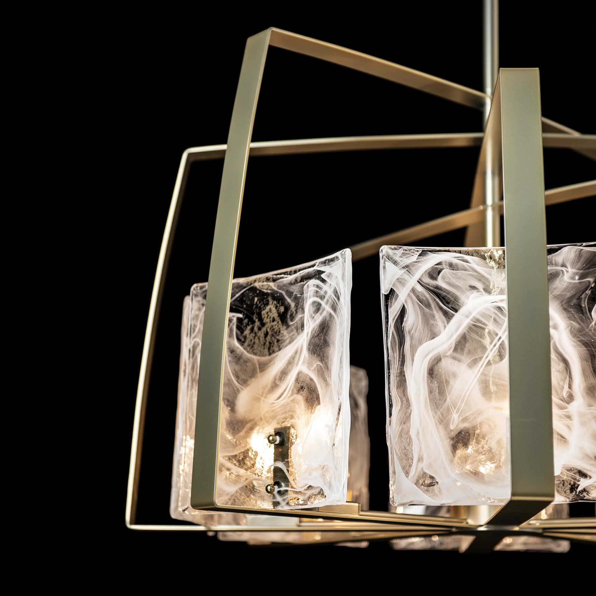 Shown in Modern Brass finish and White Swirl glass