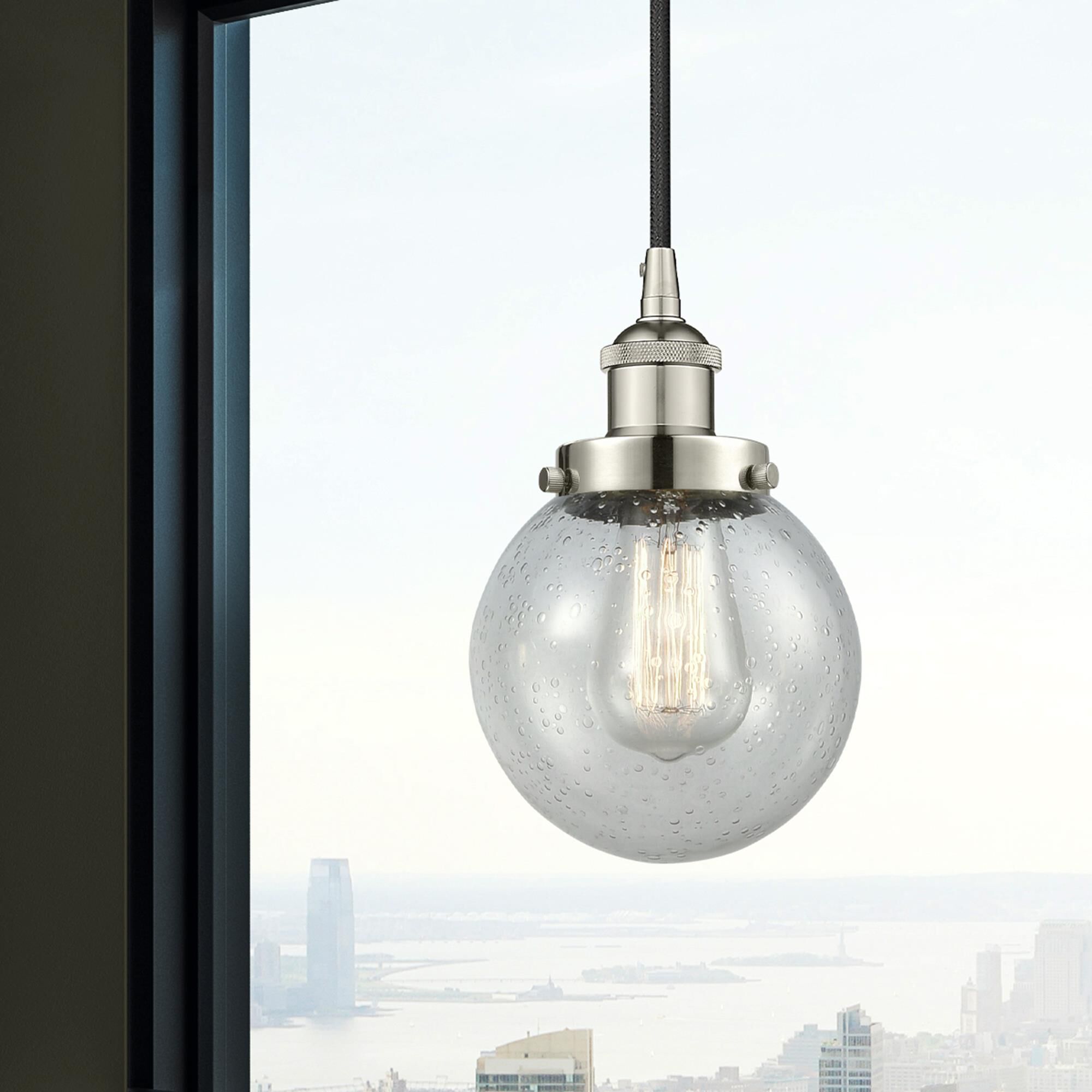 Shown in Polished Nickel finish and Seedy glass