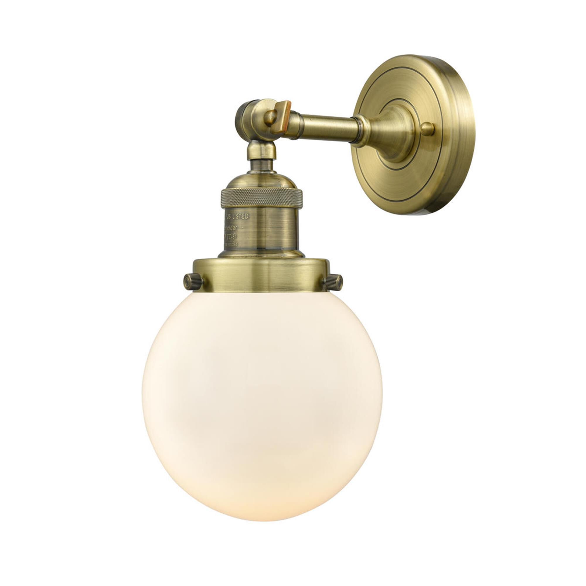Shown in Antique Brass finish and Matte White Cased glass and No Accent accent