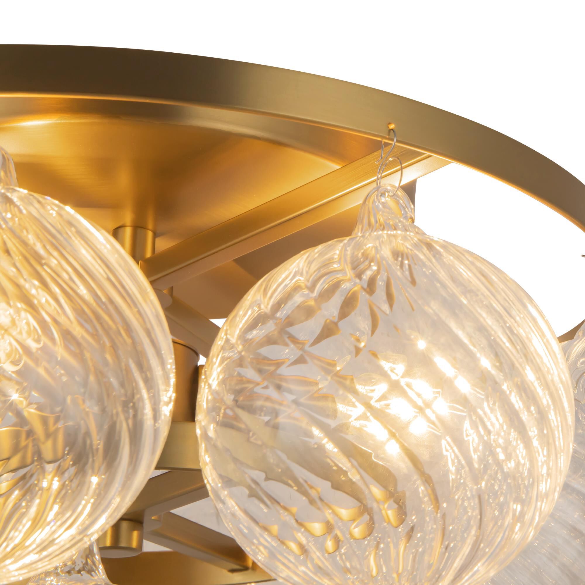 Shown in Brushed Gold finish and Clear Ribbed glass