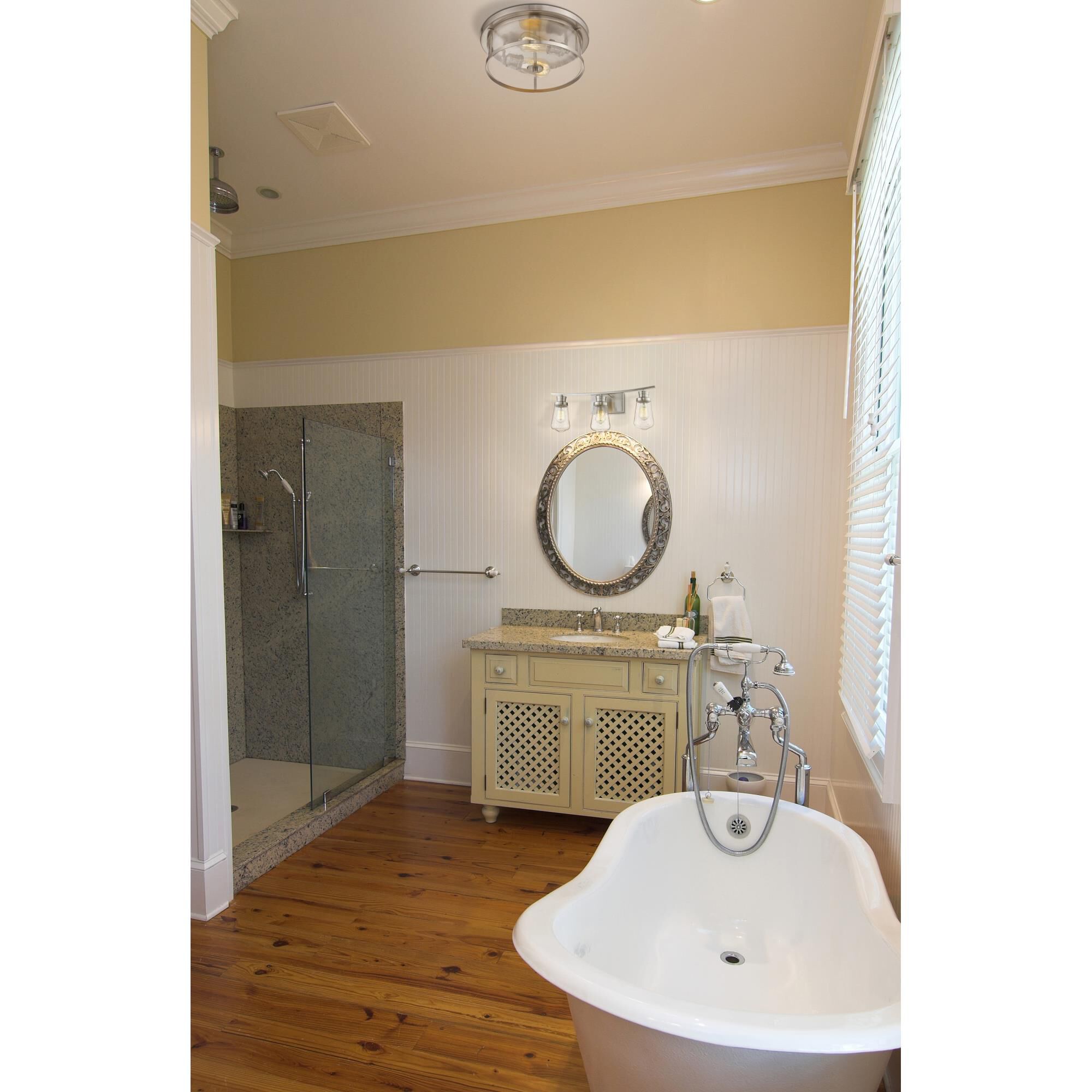 Shown in Brushed Nickel finish and Glass shade