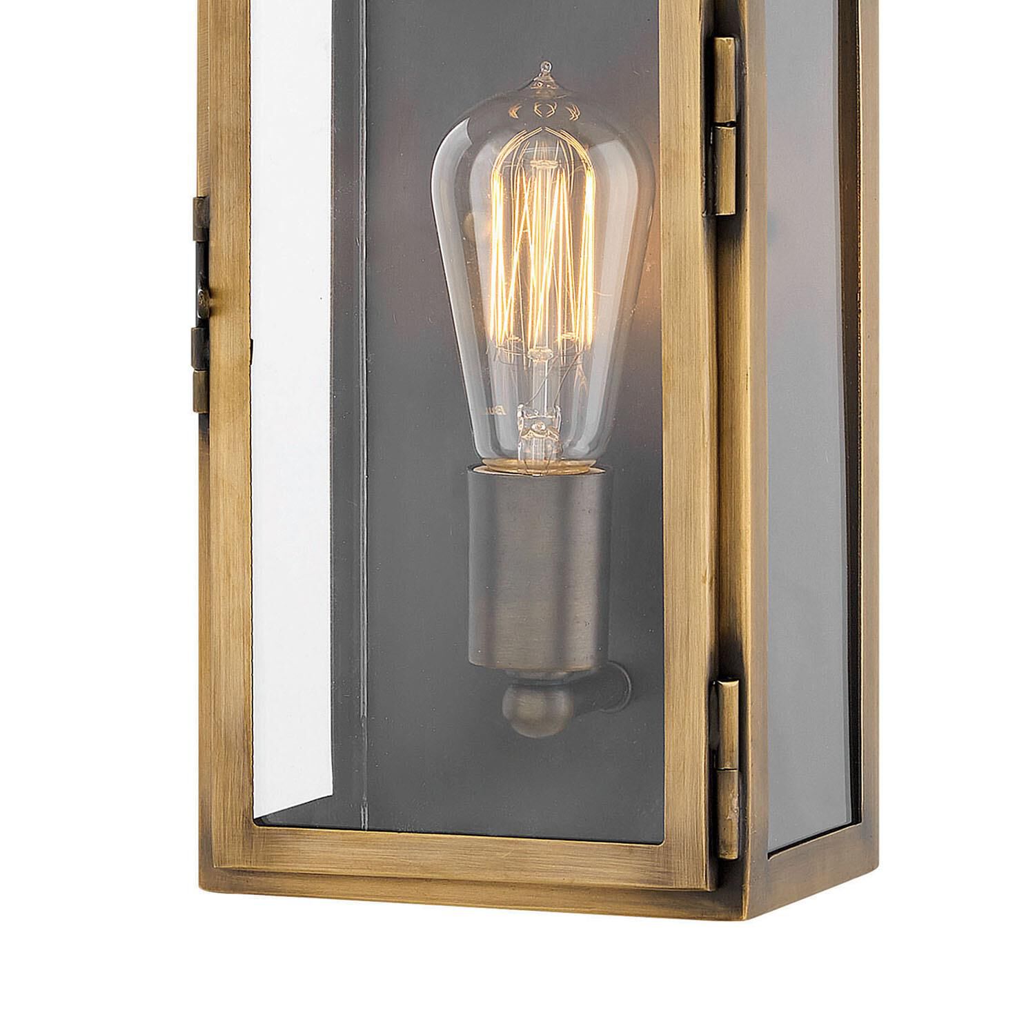 Shown in Light Antique Brass finish and Clear glass