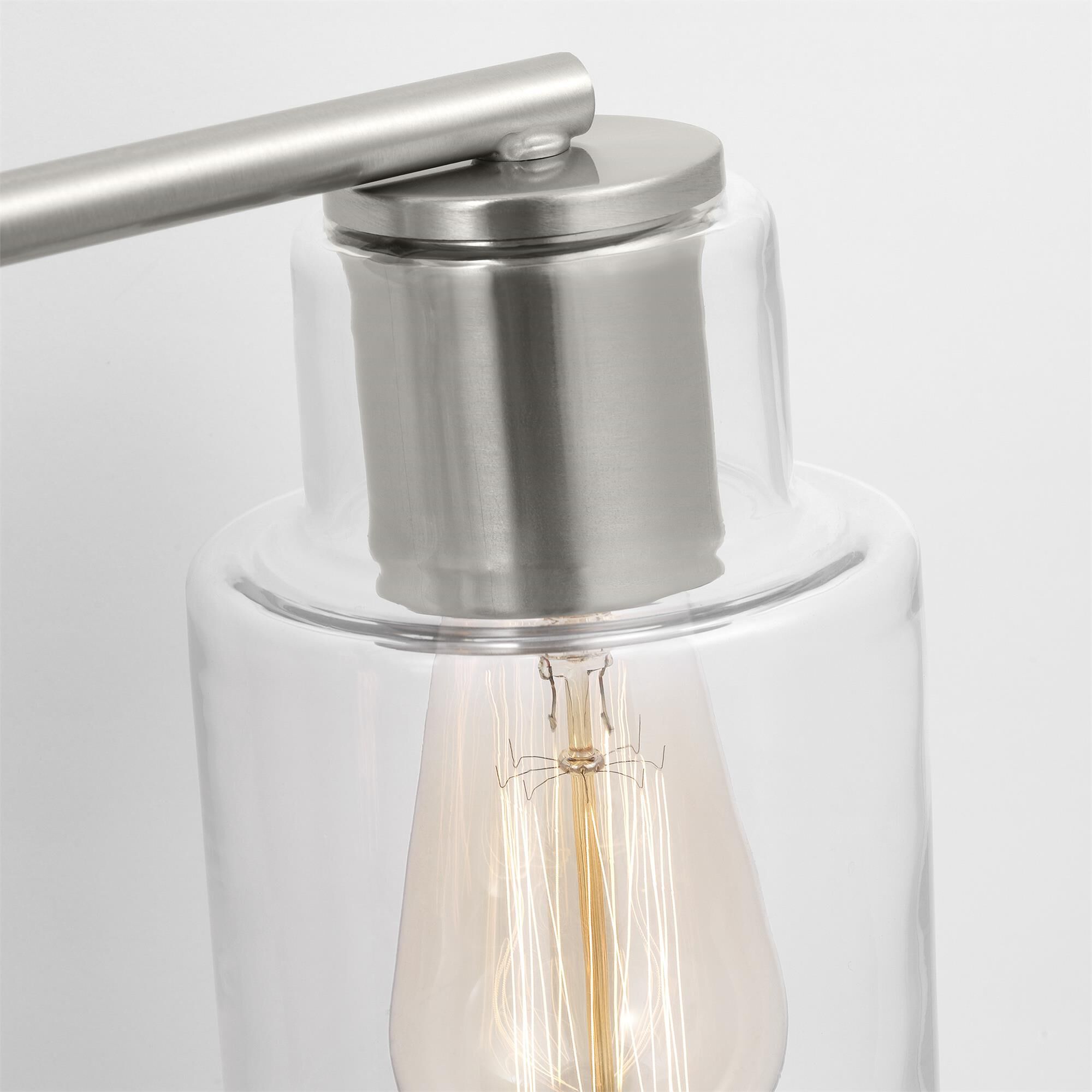 Shown in Brushed Steel finish and Clear Glass s shade