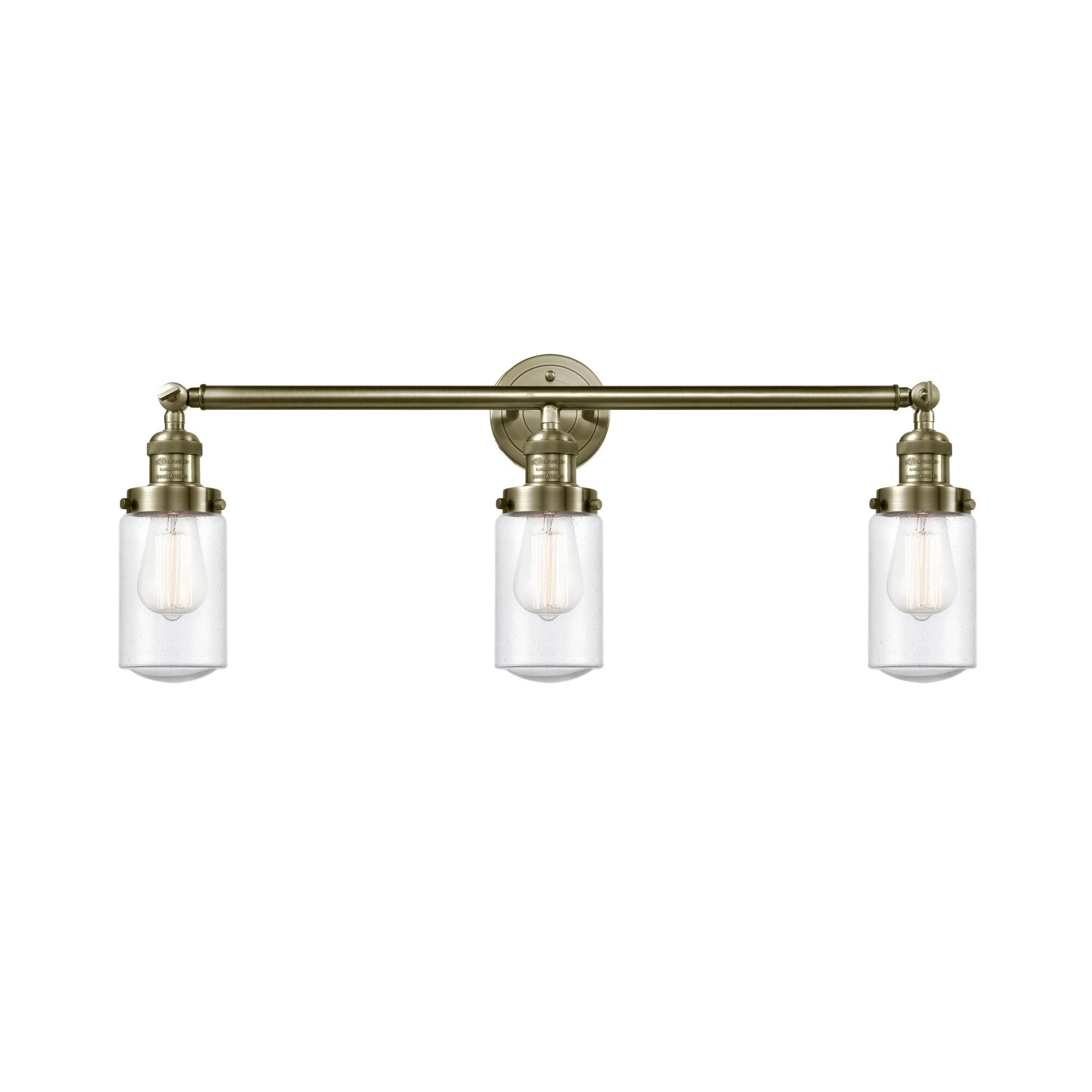 Shown in Antique Brass finish and Seedy Dover glass
