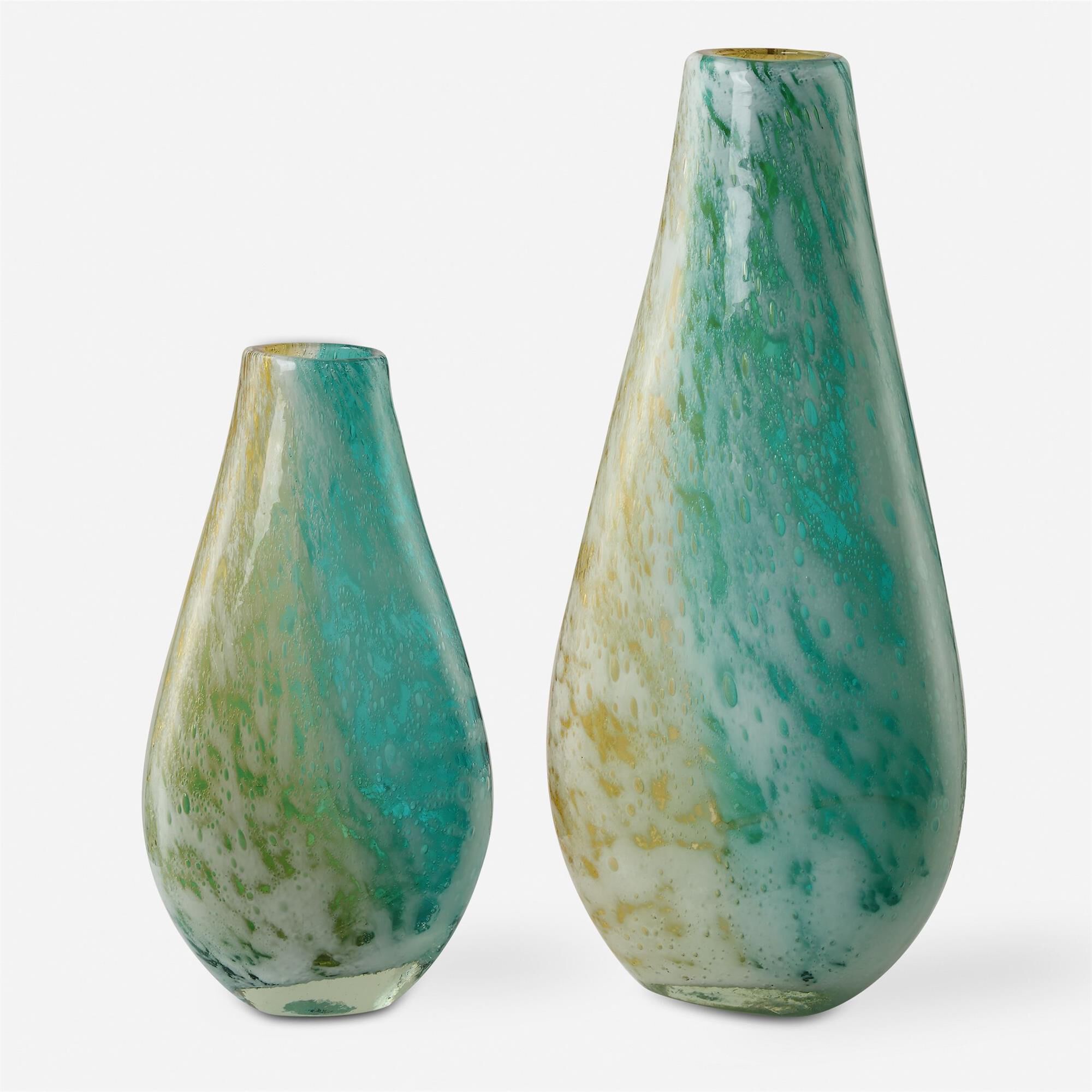 Shown in Capture The Serene Beauty Of The Ocean In Your Home With Our Exquisite Teal, Amber, And Gold Bubble  finish