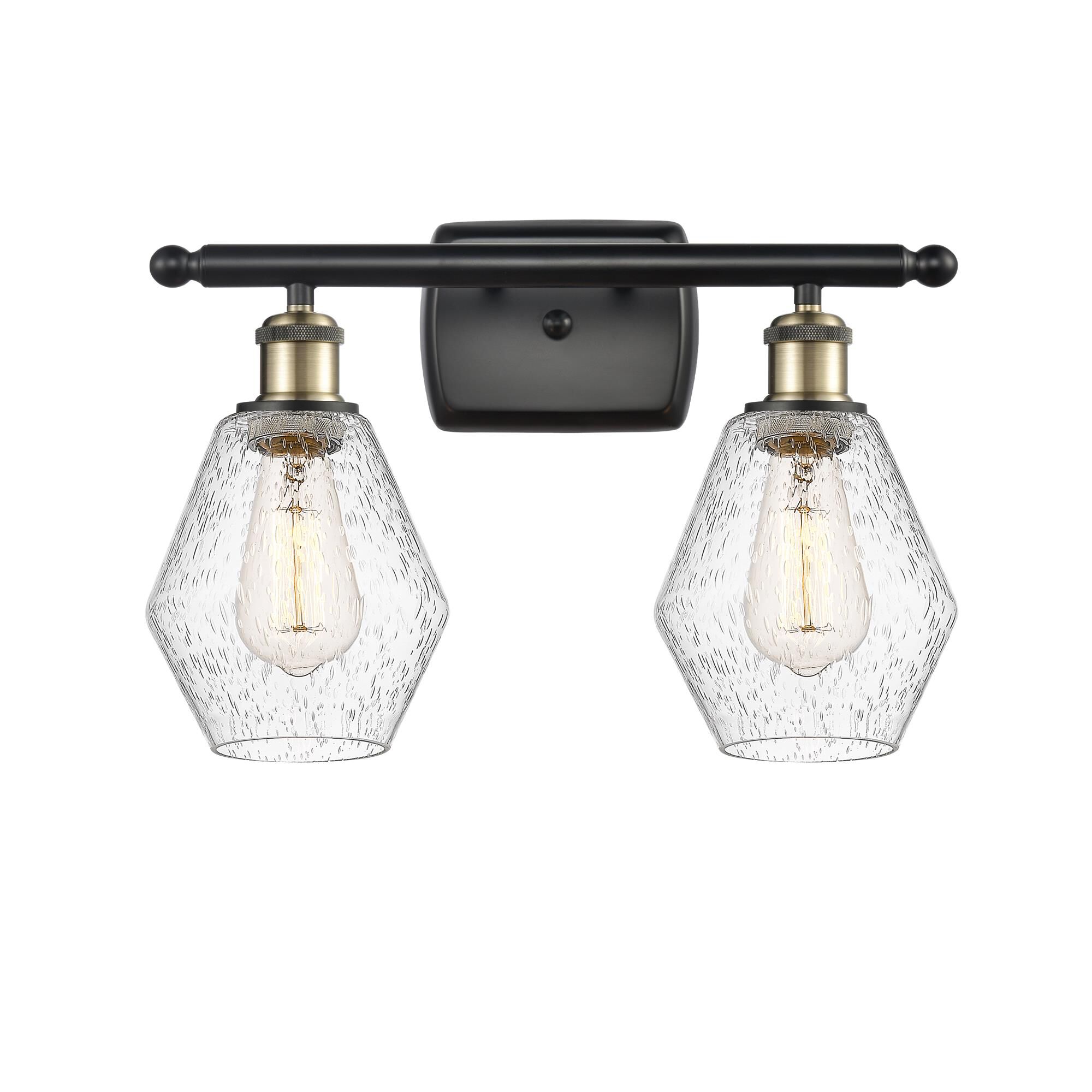 Shown in Black Antique Brass  finish and Seedy glass