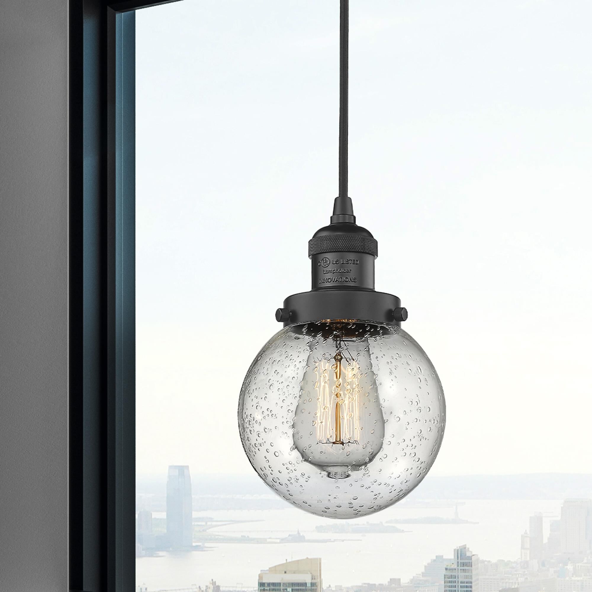 Shown in Matte Black finish and Seedy glass