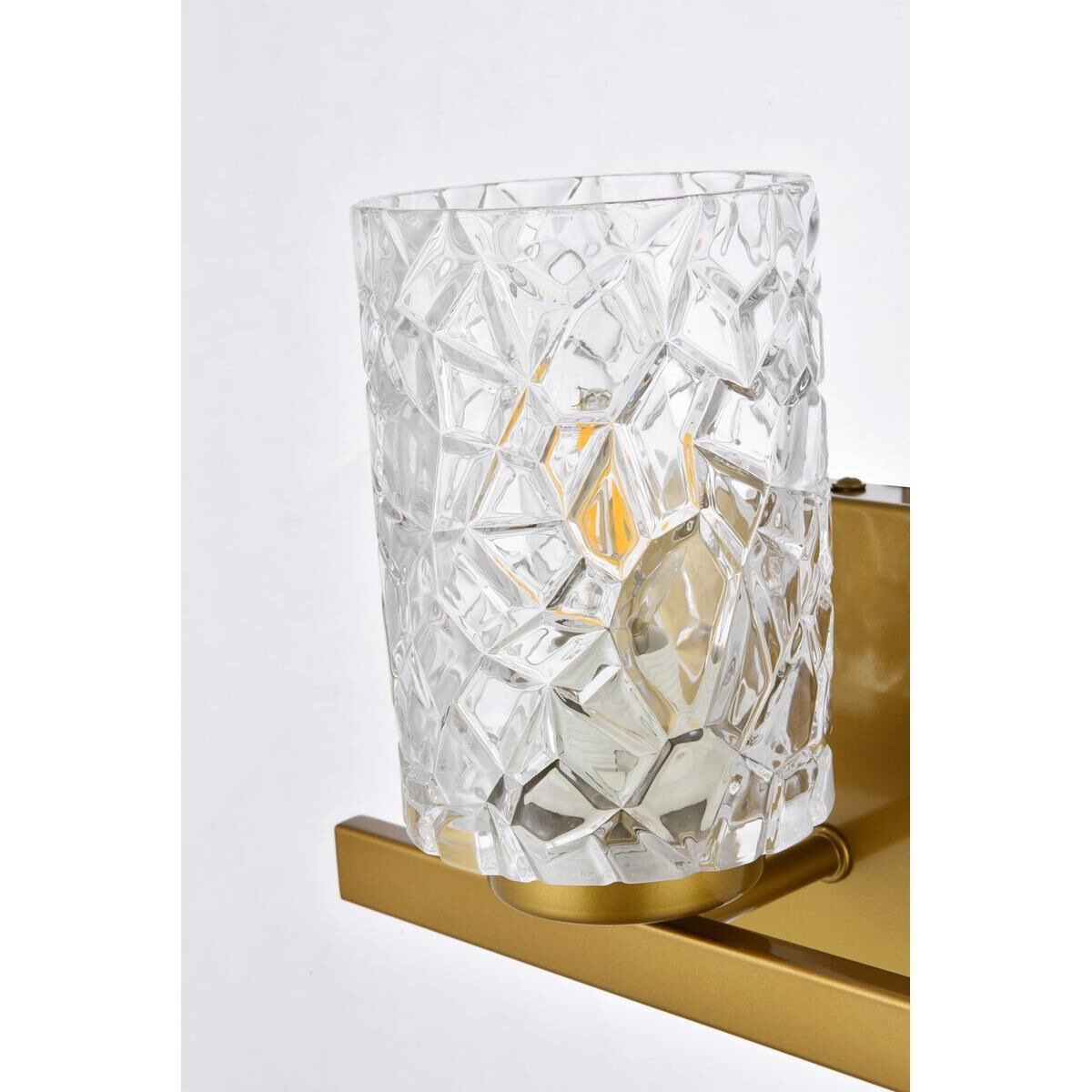 Shown in Brass finish and Clear glass