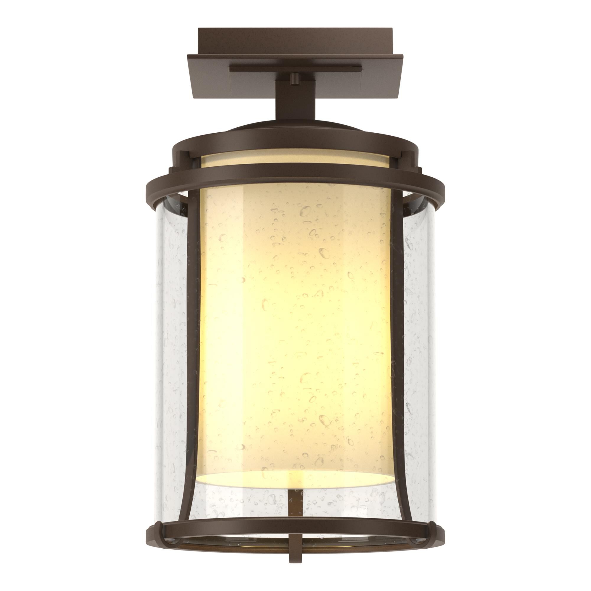 Shown in Coastal Bronze finish and Clear Seeded with Opal glass