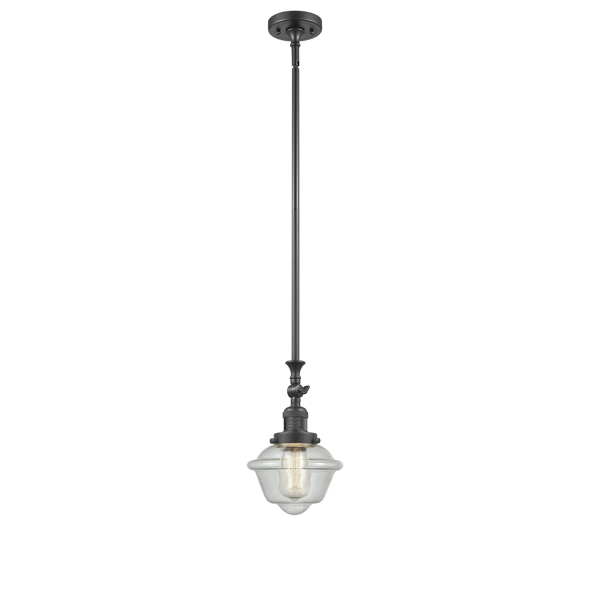 Shown in Oil Rubbed Bronze finish and Seedy glass